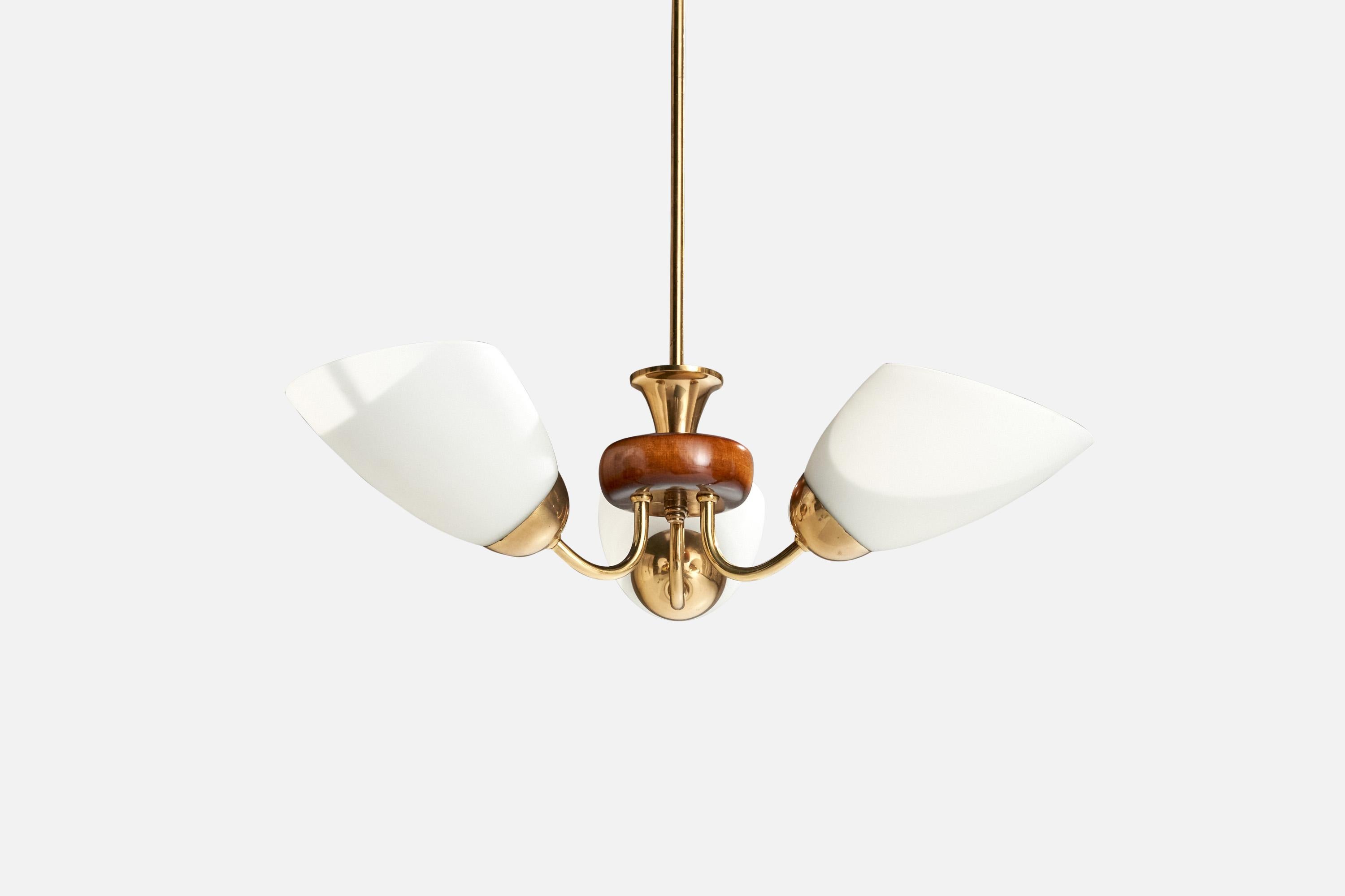 A brass, wood and white opaline glass chandelier designed and produced in Sweden, c. 1950s.

Overall Dimensions (inches): 18.75” H x  21.25” Diameter

Dimensions of Canopy:  2.5” H x 3.75” W x 3.75” D

Stem length: 16” H

Bulb Specifications: E-26 
