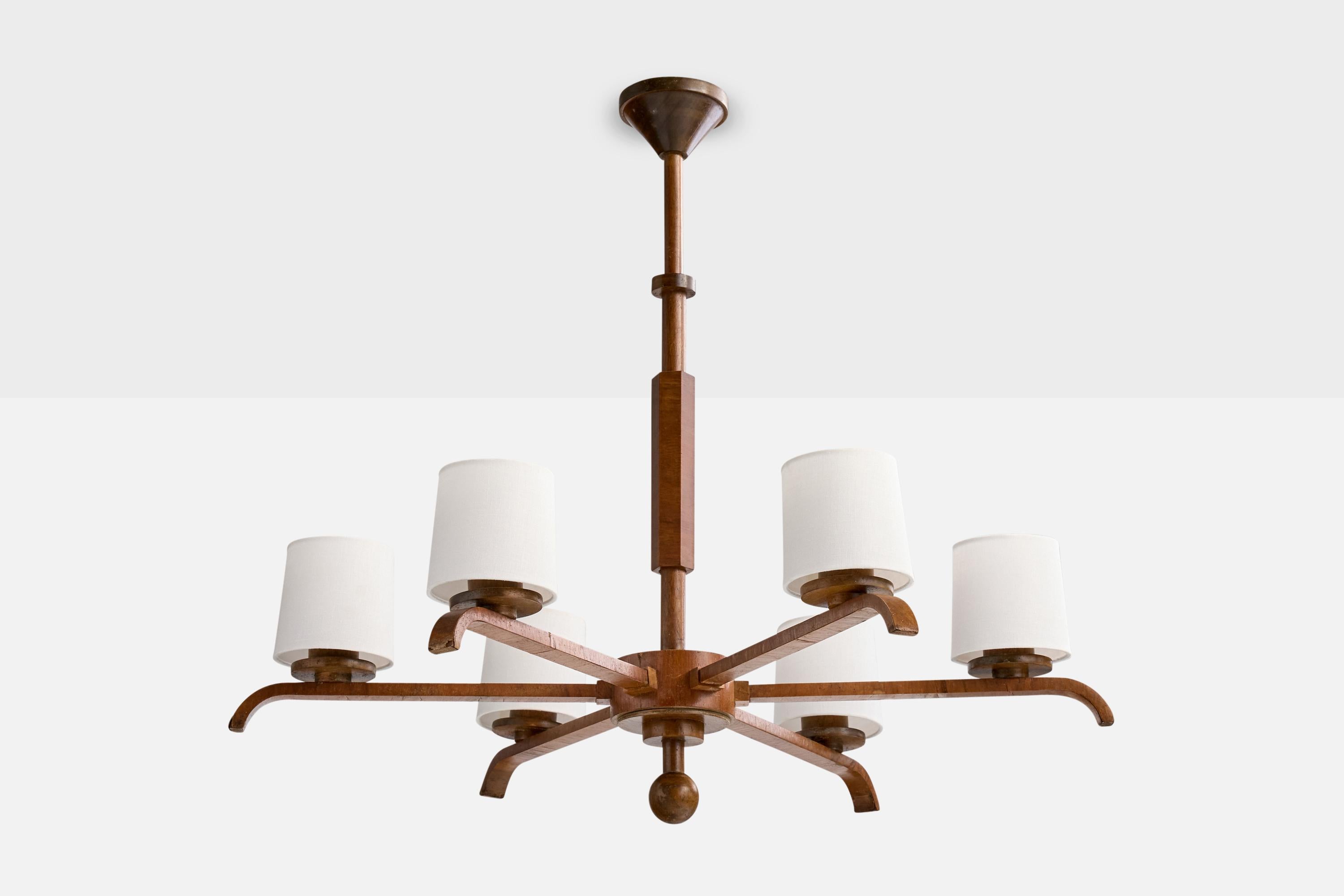 Lustre en bois et tissu blanc, probablement conçu et produit en Suède, vers les années 1930.

Dimensions globales (pouces) : 28.5 