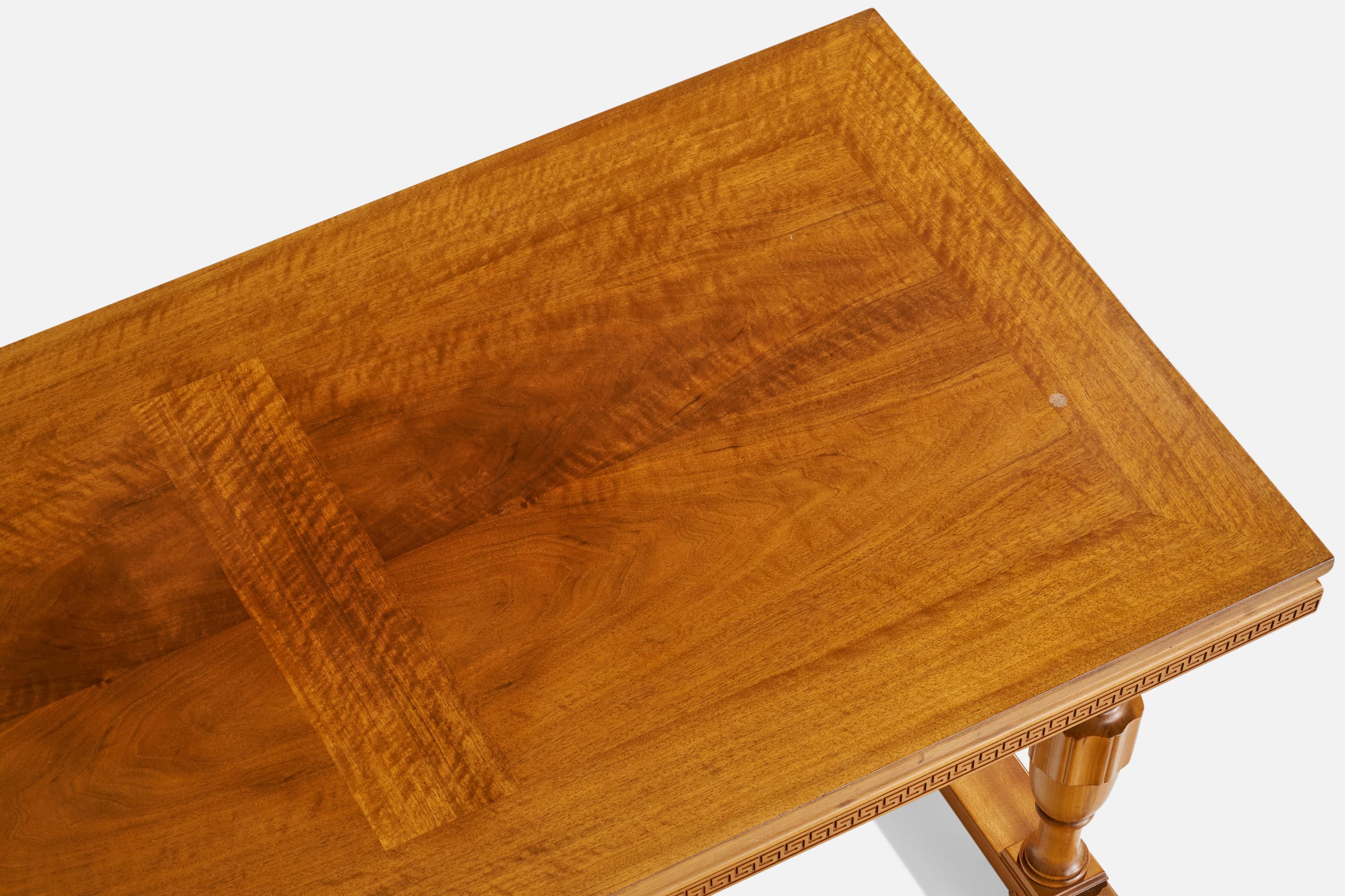 A wood coffee table designed and produced in Sweden, c. 1930s.