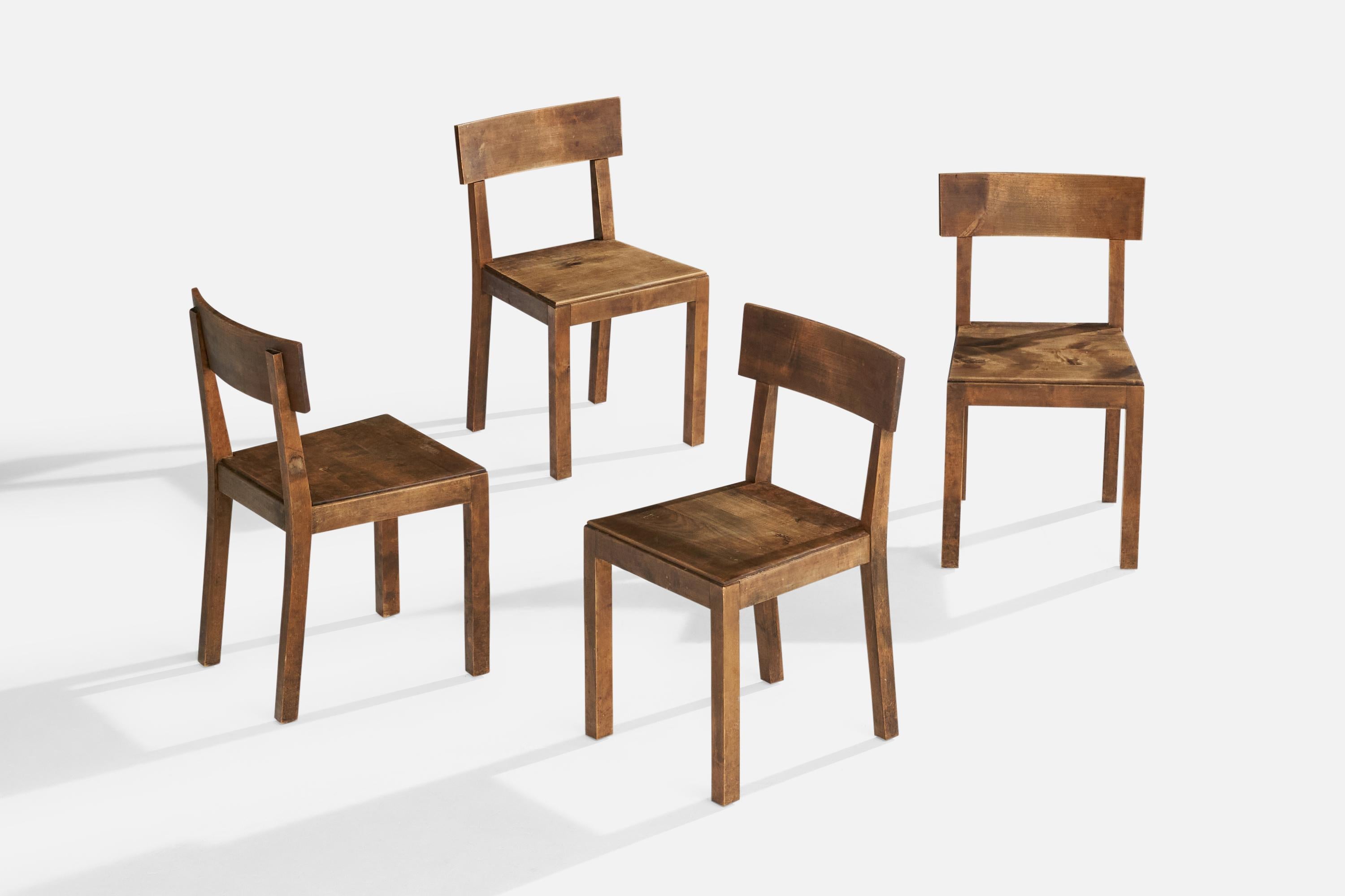 A set of four dark-stained birch dining or side chairs designed and produced in Sweden, c. 1930s.

Dimensions: 30.625” H x 16.4” W x 17.25” D

Seat Height: 17.25” 