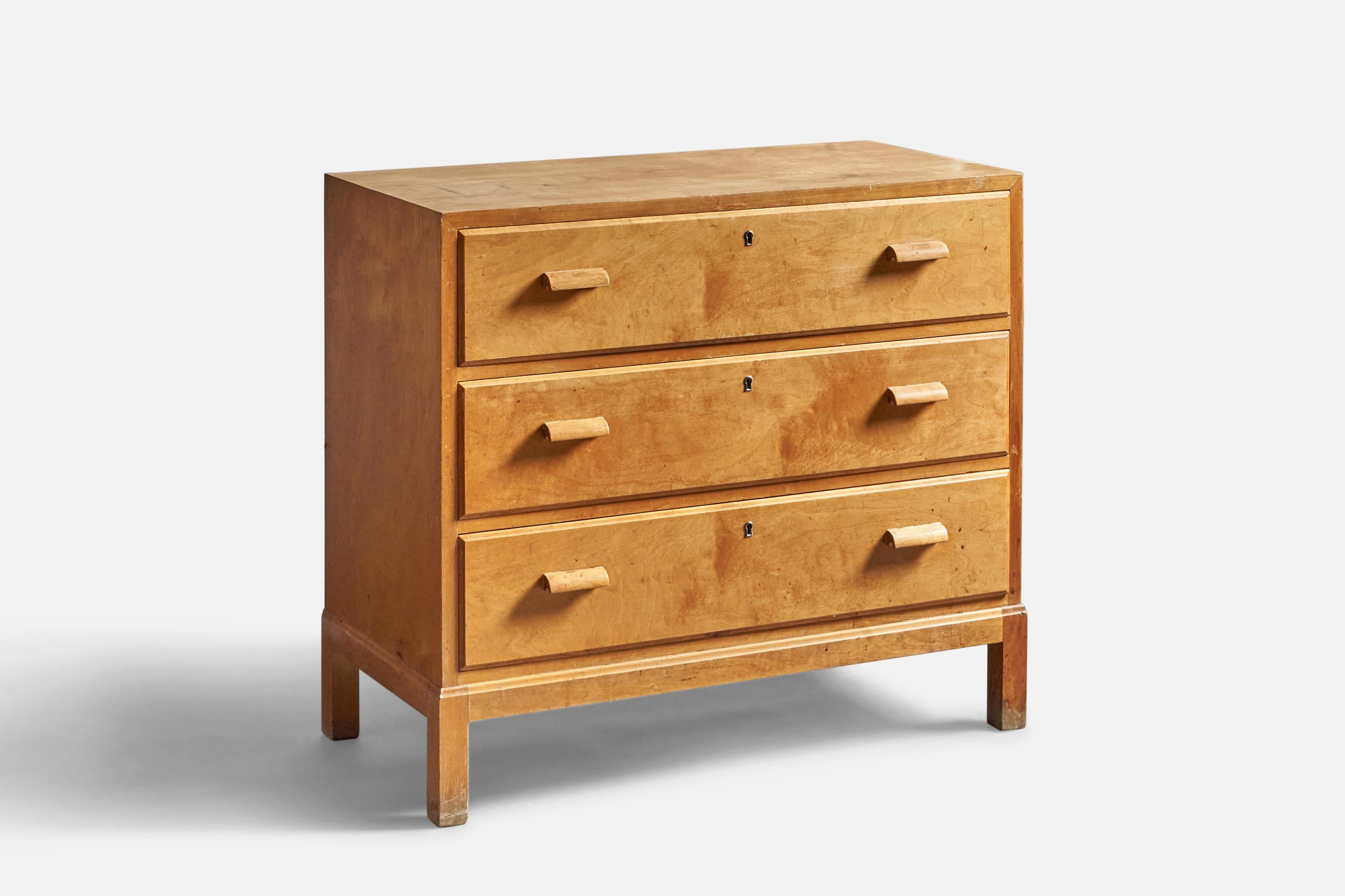 A wood dresser or chest of drawers, designed and produced in Sweden, c. 1930s.
