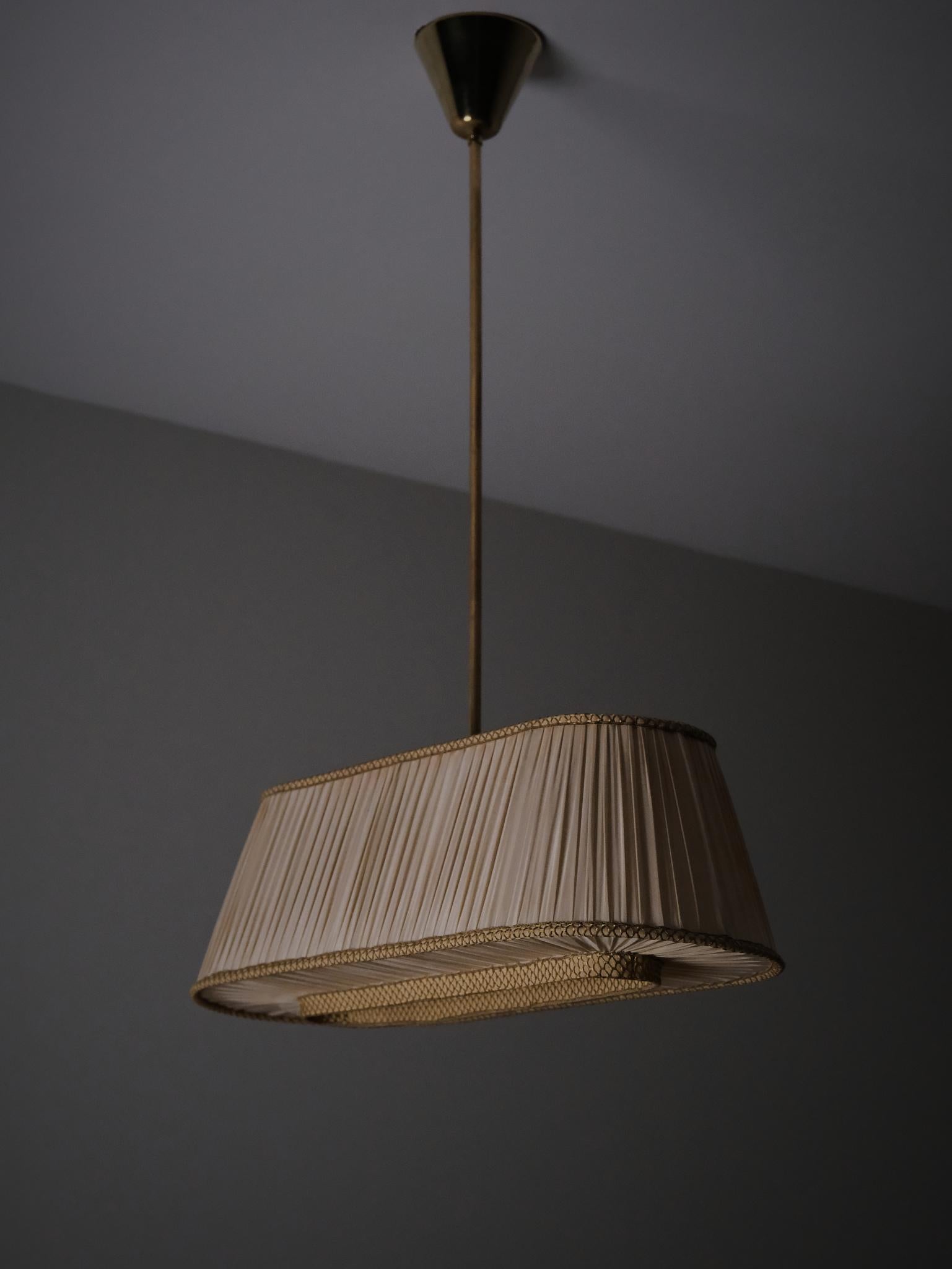 Brass Swedish designer fabric and brass ceiling lamp, 1940s For Sale