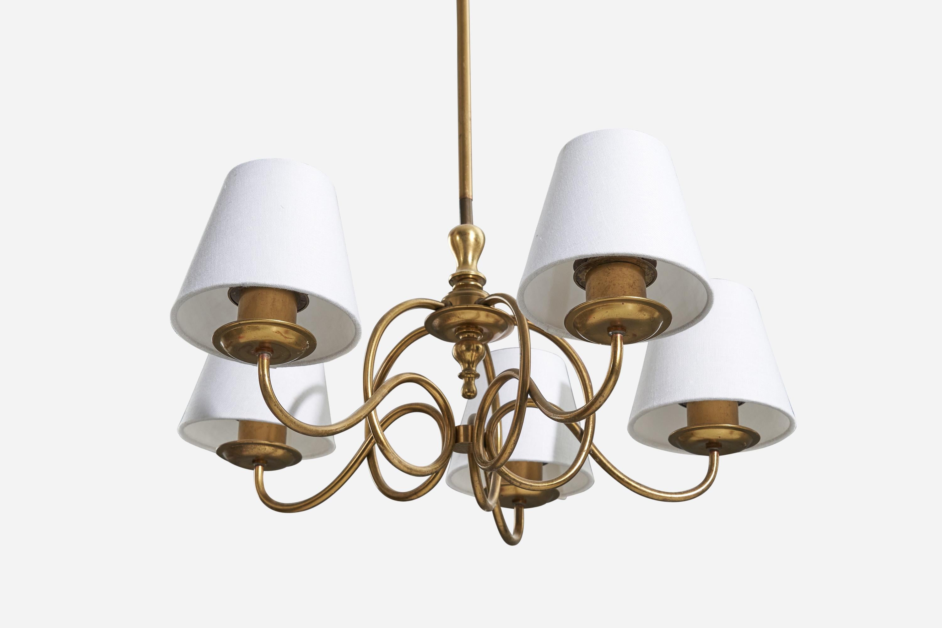 A brass and white fabric, five-armed chandelier, designed and produced in Sweden, 1940s. 

Sold with lampshades. 
Dimensions of Lamp (inches) : 24.375 x 16.375 x 16.375 (H x W x D)
Dimensions of Shades (inches) : 3 x 5.125 x 4.5 (T x B x
