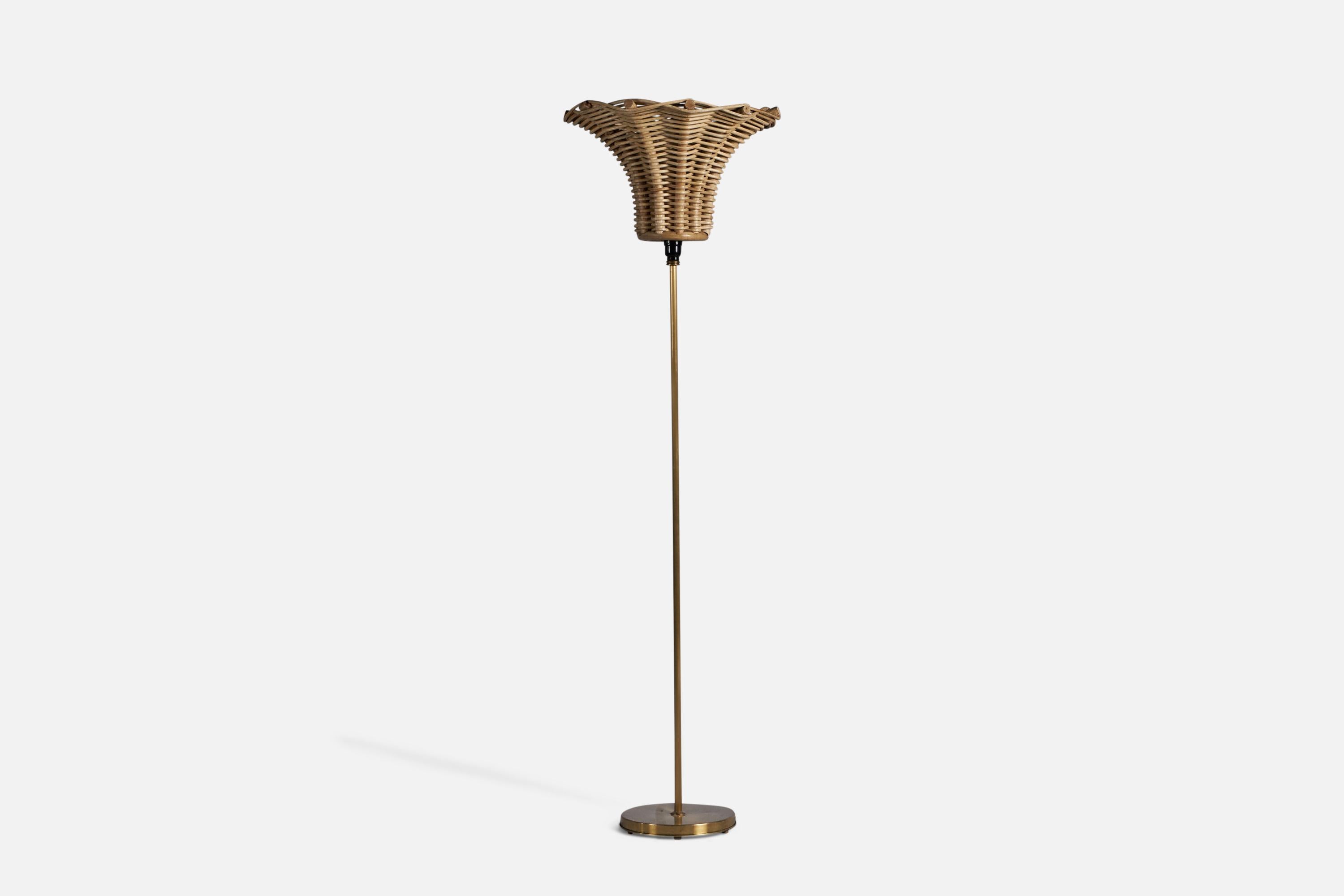 A brass and rattan floor lamp, designed and produced in Sweden, 1940s.

Overall Dimensions (inches): 61