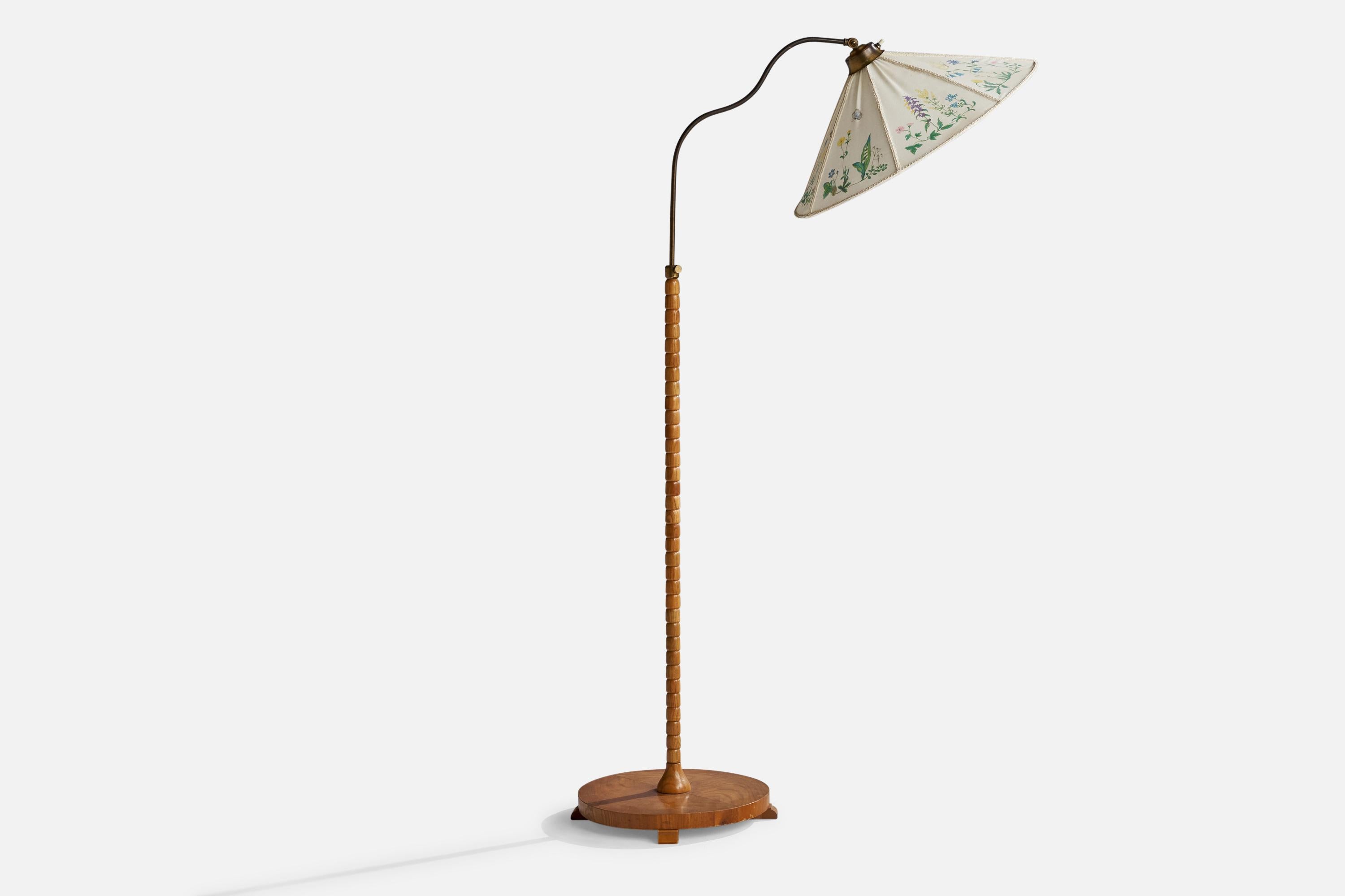 A brass, elm and floral printed fabric floor lamp designed and produced in Sweden, 1940s.

Dimensions variable.

Overall Dimensions (inches): 57”  H x 20”  W x 35” D
Stated dimensions include shade.
Bulb Specifications: E-26 Bulb
Number of Sockets:
