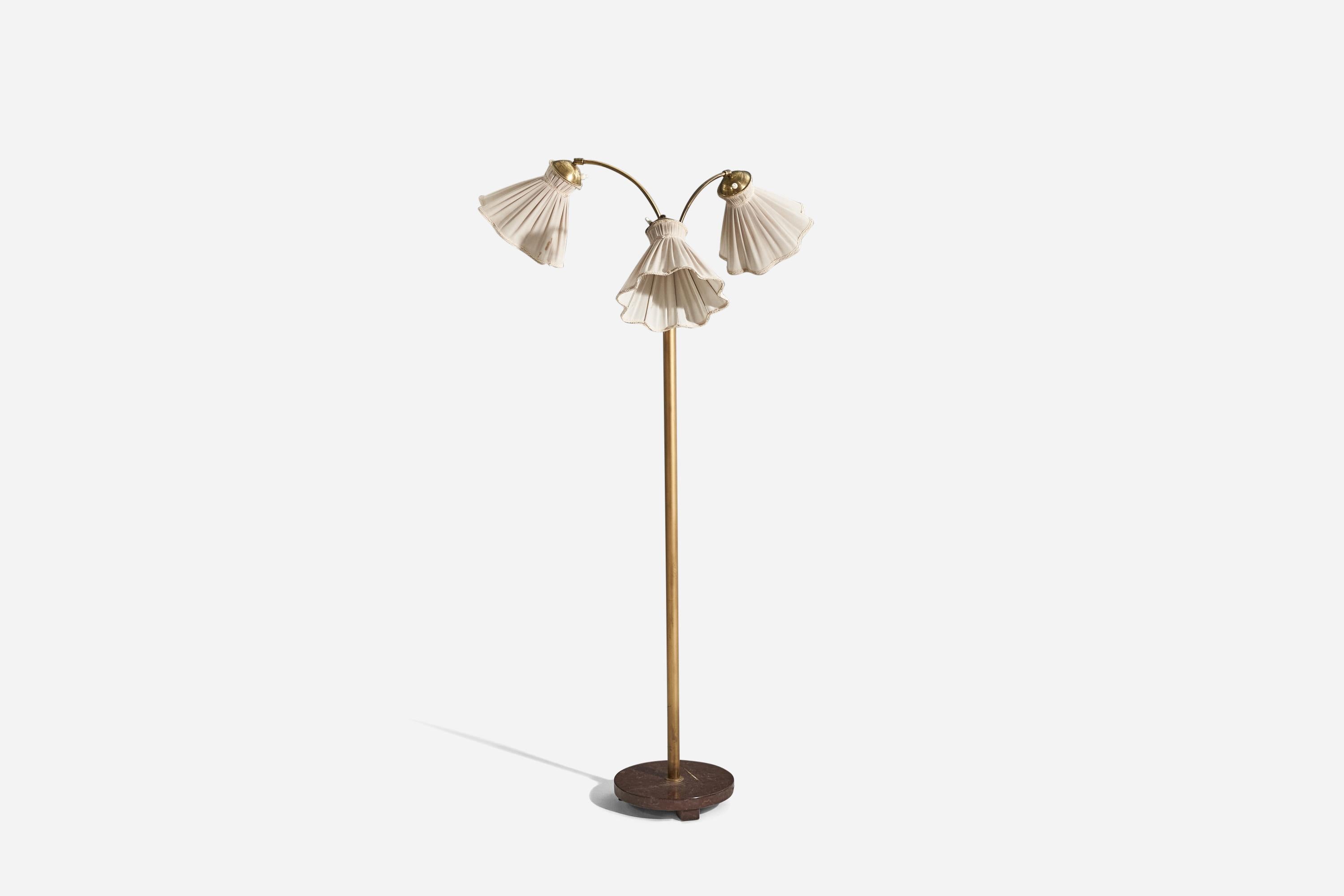 A brass, fabric and marble floor lamp designed and produced by a Swedish designer, Sweden, 1930s. 

Sold with lampshade. 
Stated dimensions refer to the floor lamp with shade. 
Variable dimensions, measured as illustrated in the first image.