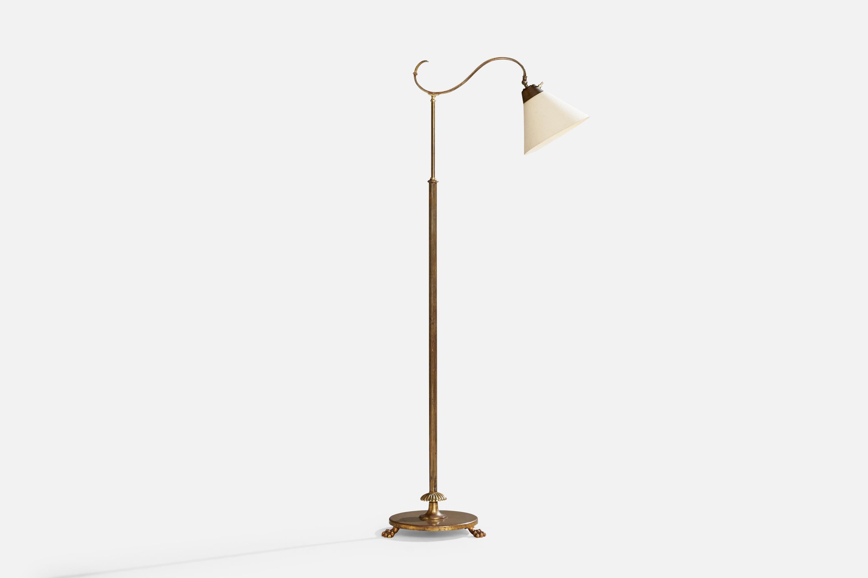 Lampada da terra regolabile in ottone e tessuto bianco sporco progettata e prodotta in Svezia, anni '1930 circa.

Dimensioni della lampada con paralume (pollici): 60,375