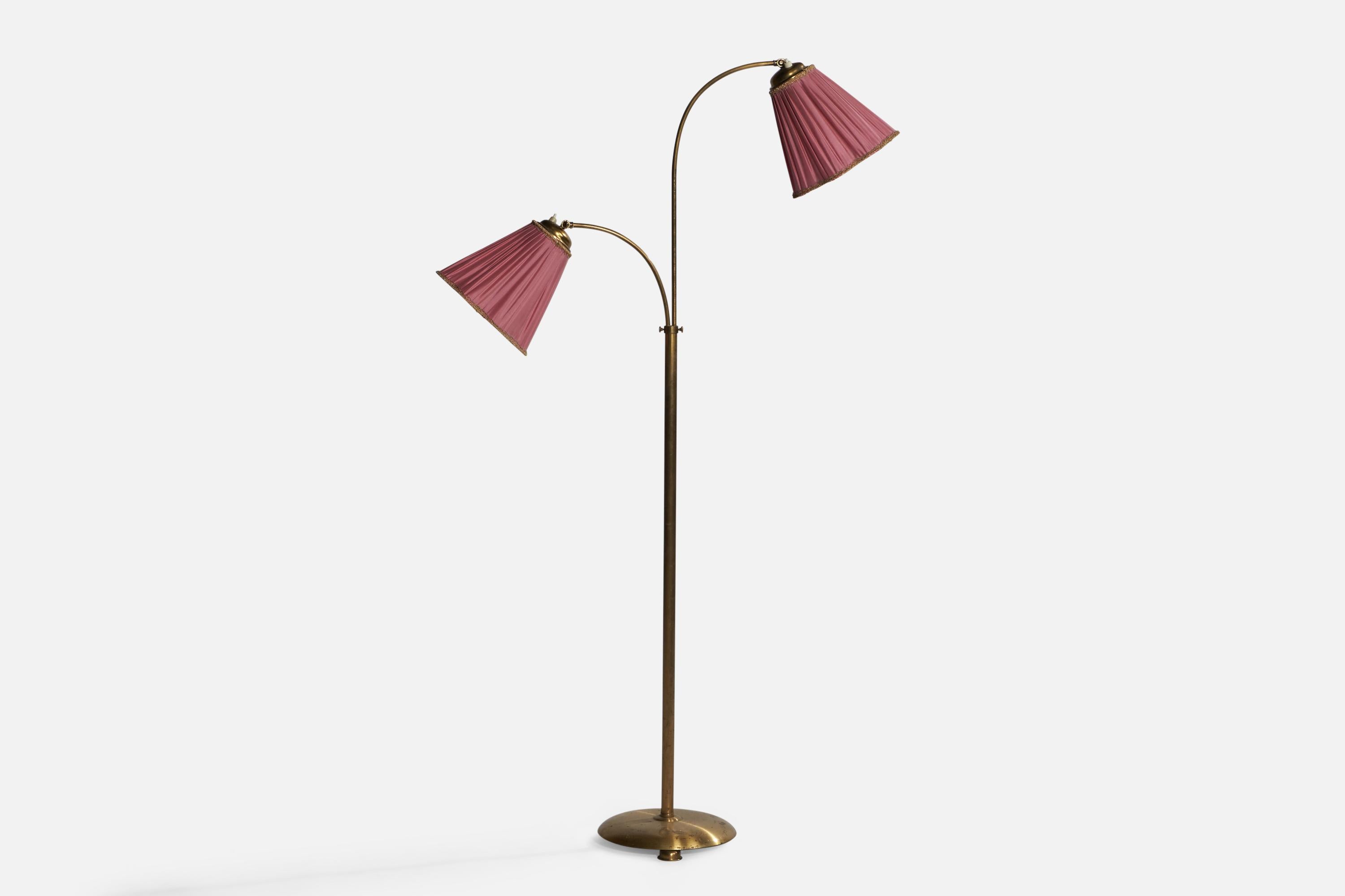 An adjustable two-armed brass and purple fabric floor lamp designed and produced in Sweden, 1940s.

Overall Dimensions (inches): 62.25” H x 36” W 11.25” D. Stated dimensions include shades.
Dimensions vary based on position of lights.
Bulb
