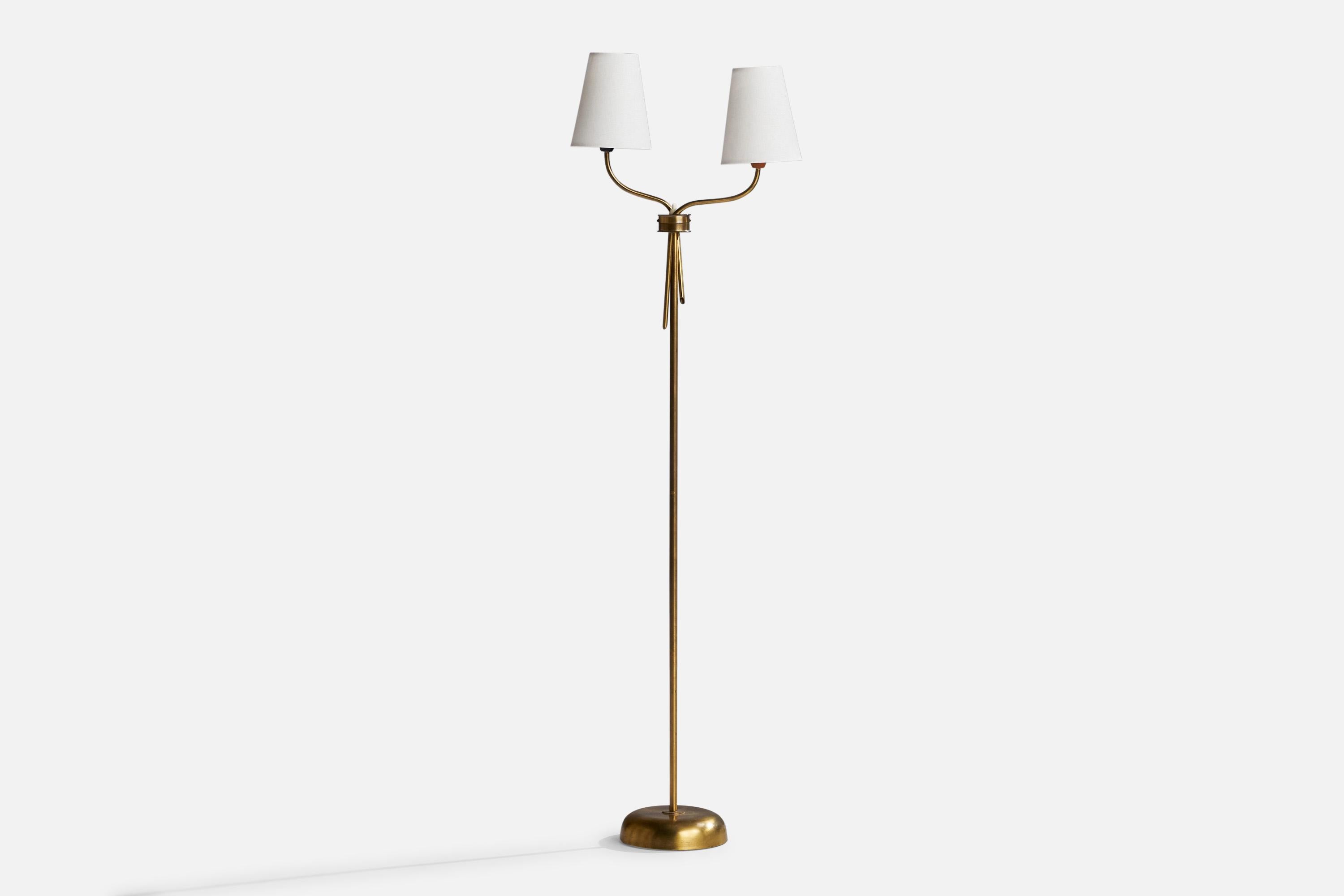 A two-armed brass and white fabric floor lamp designed and produced in Sweden, 1940s.

Dimensions of Lamp (inches): 47”  H x 6.5” Diameter
Dimensions of Shade (inches): 3” Top Diameter x 5” Bottom Diameter x 6” H
Dimensions of Lamp with Shade