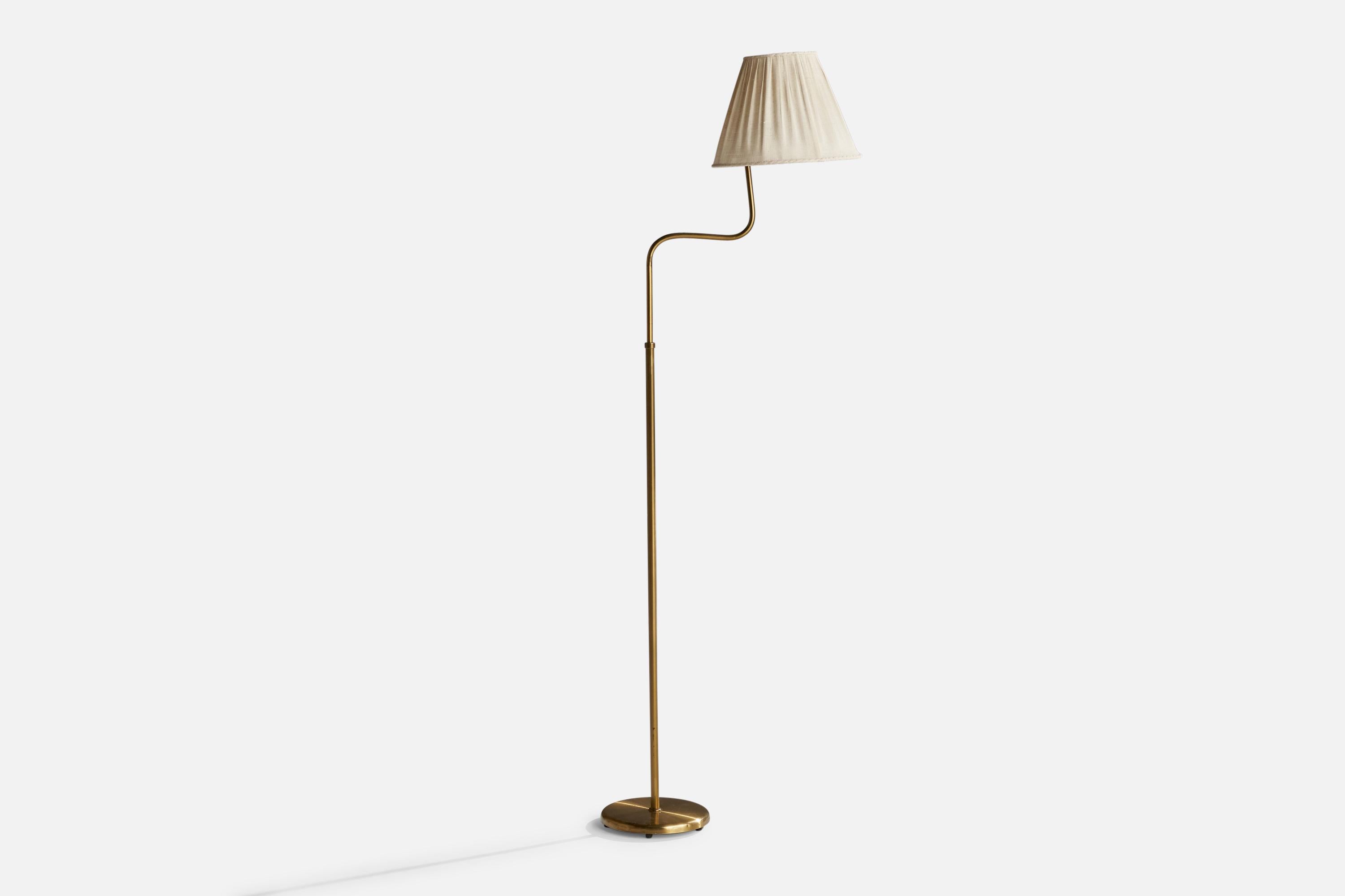 A brass and off-white fabric floor lamp designed and produced in Sweden, 1940s.

Overall Dimensions (inches): 60” H x 12.5” W x 24” D
Stated dimensions include shade.
Bulb Specifications: E-26 Bulb
Number of Sockets: 1
All lighting will be converted