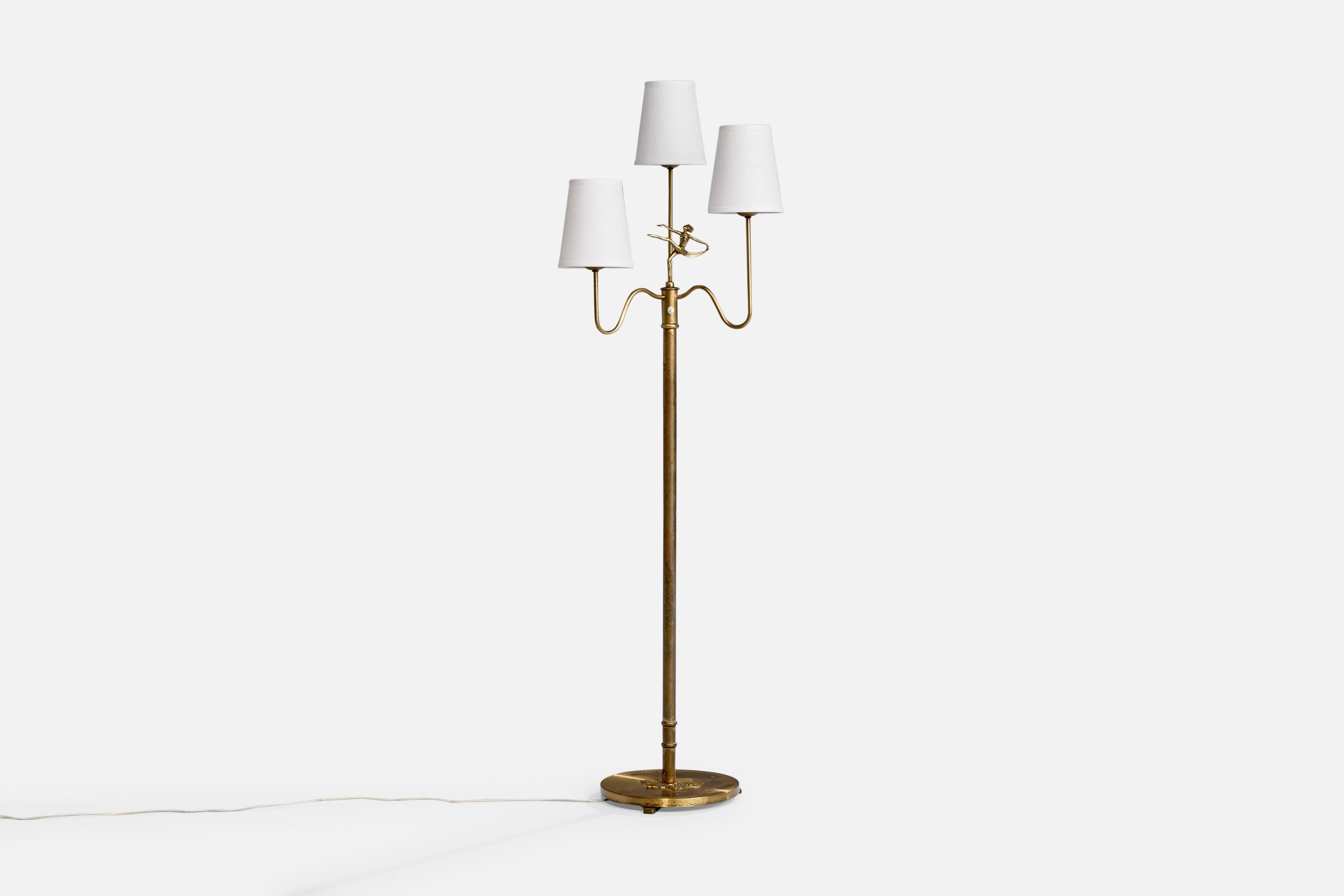 Lampada da terra in ottone e tessuto bianco progettata e prodotta in Svezia, anni '1940 circa.

Dimensioni della lampada con paralume (pollici): 59,75
