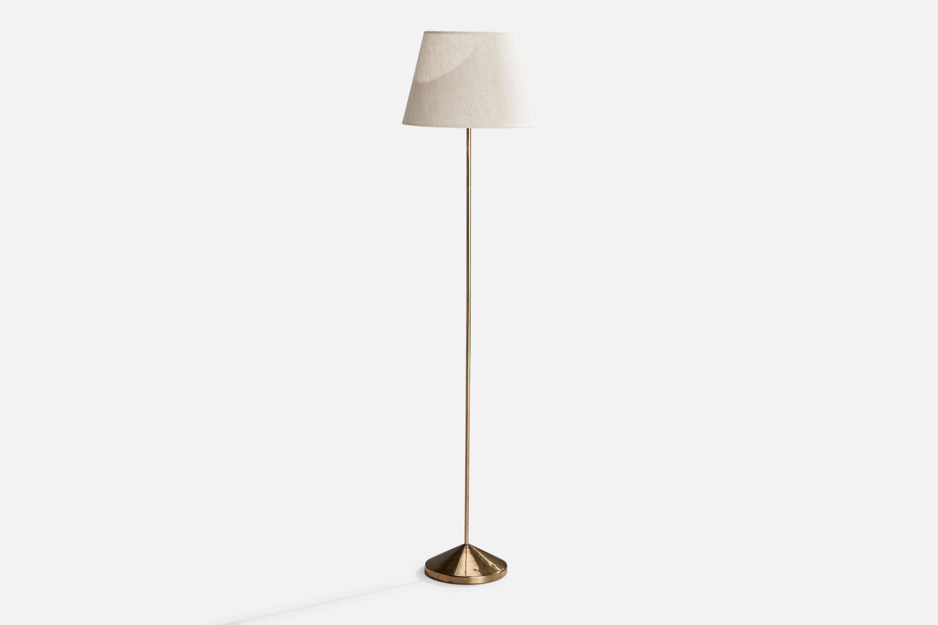 A brass and off-white fabric floor lamp designed and produced in Sweden, c. 1960s.

Overall Dimensions (inches): 58” H x 13.875” W x 14” D
Stated dimensions include shade.
Bulb Specifications: E-26 Bulb
Number of Sockets: 1
All lighting will be