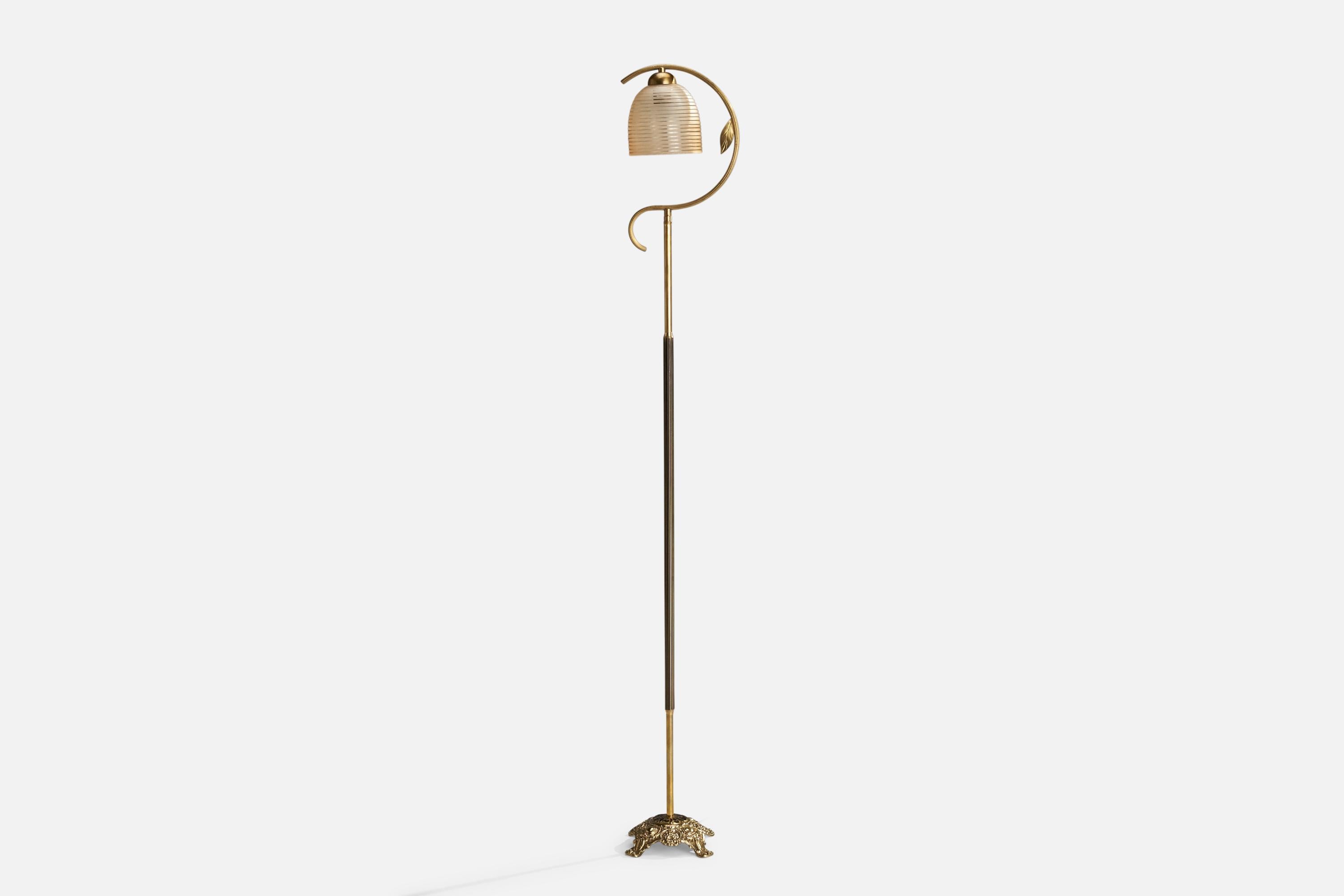 A brass and etched beige glass floor lamp designed and produced in Sweden, c. 1970s.

Overall Dimensions (inches): 60” H x 5.5” W x 8” D
Stated dimensions include shade.
Bulb Specifications: E-26 Bulb
Number of Sockets: 1
All lighting will be