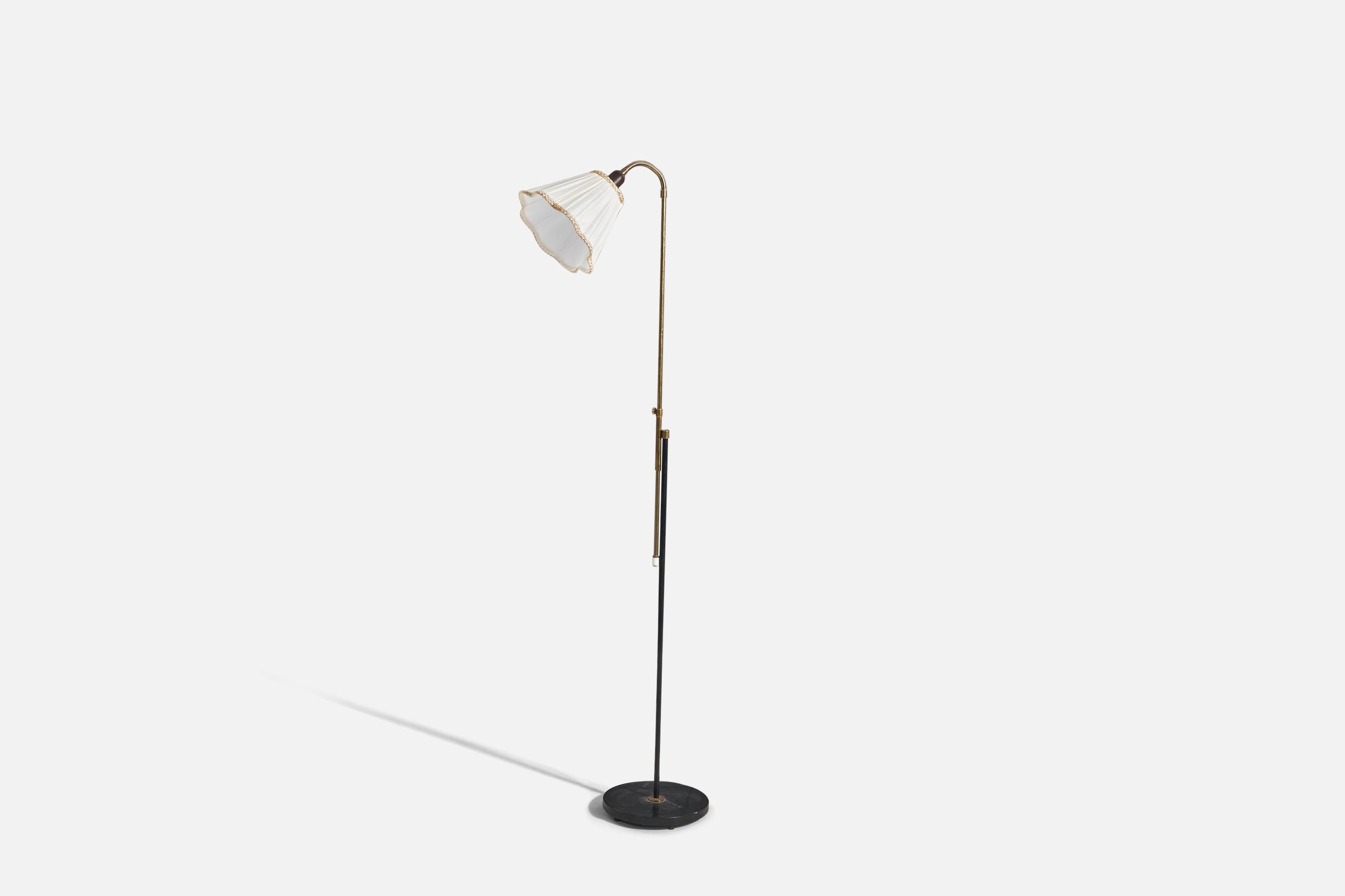 A brass, metal and fabric floor lamp designed and produced by a Swedish designer, Sweden, 1950s. 

Variable dimensions, measured as illustrated in the first image. 
Sold with lampshades. 
Stated dimensions refer to the floor lamp with the