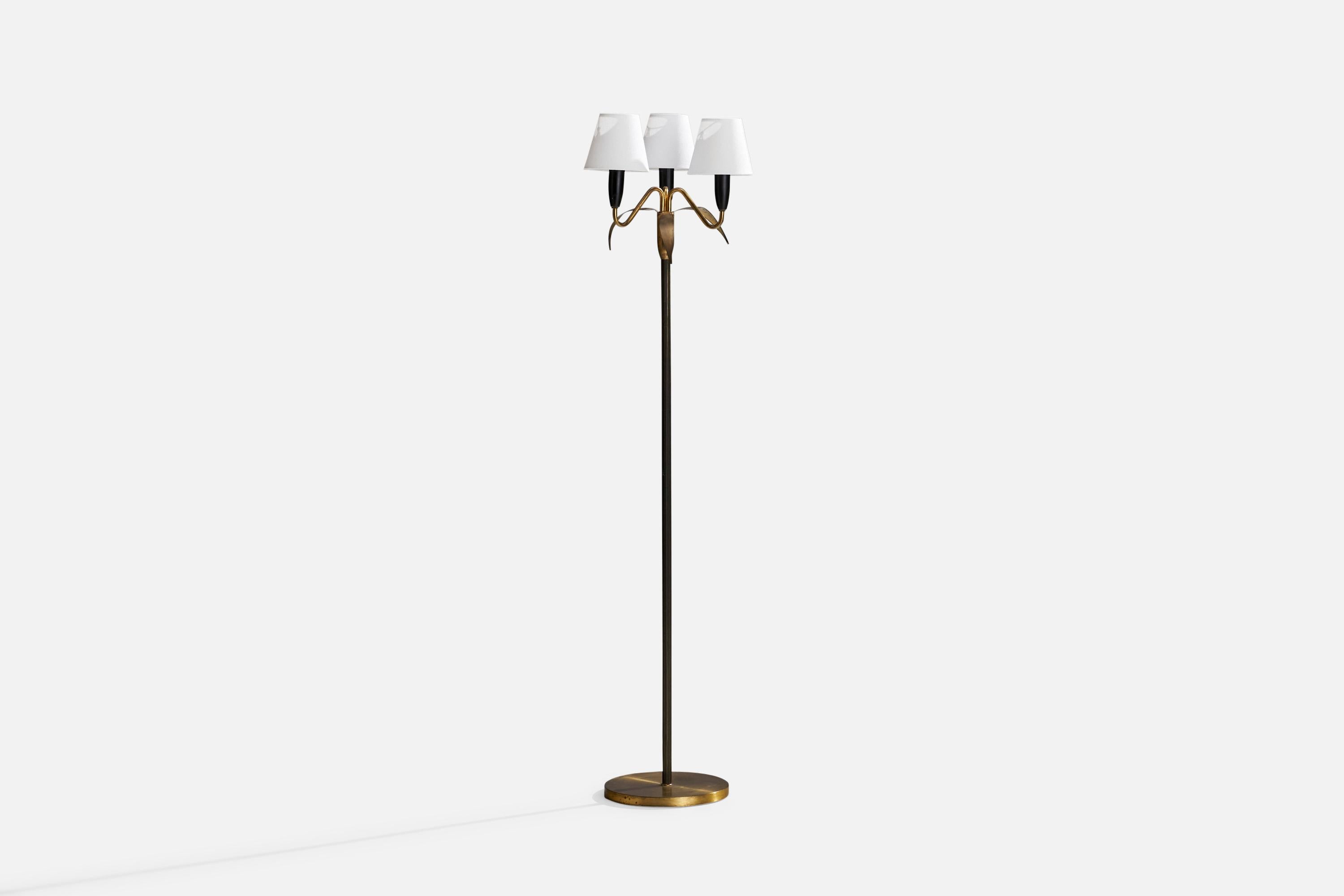 A brass, black-lacquered metal and white fabric floor lamp designed and produced in Sweden, c. 1960s.

Overall Dimensions (inches): 55”  H x 14” W x 7” D
Stated dimensions include shade.
Bulb Specifications: E-26 Bulb
Number of Sockets: 3
All
