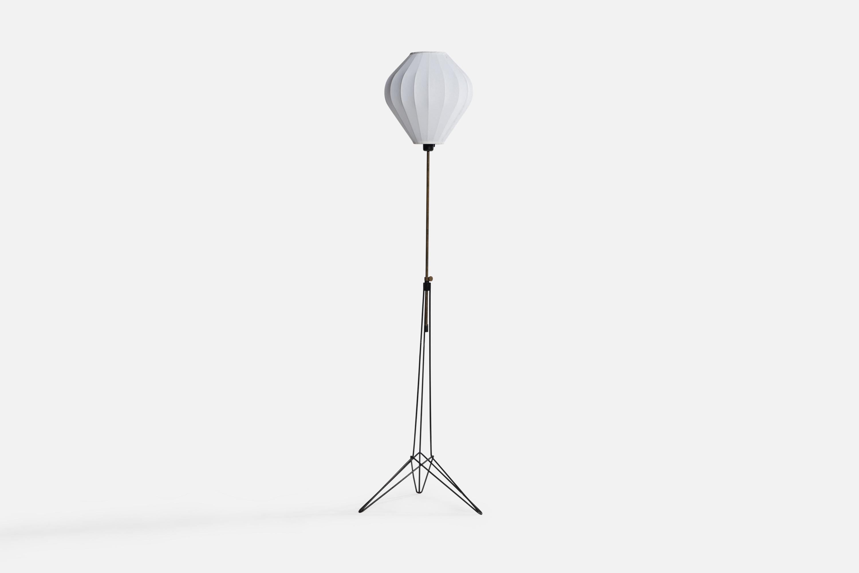 A brass, black-lacquered metal and fabric floor lamp designed and produced in Sweden, c. 1950s.

Overall Dimensions (inches): 61.25” H x 16” W x 16” D. Stated dimensions include shade.
Bulb Specifications: E-26 Bulb
Number of Sockets: 1
All lighting