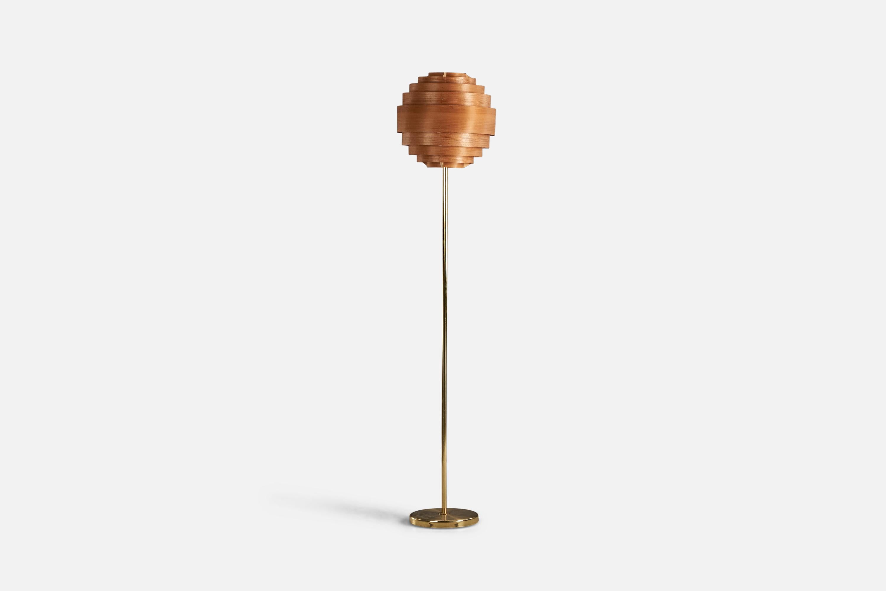 A brass and moulded pine veneer floor lamp designed and produced by a Swedish Designer, Sweden, 1970s.

With an assorted vintage lampshade designed by Hans-Agne Jakobsson.

Socket takes standard E-26 medium base bulb.

There is no maximum