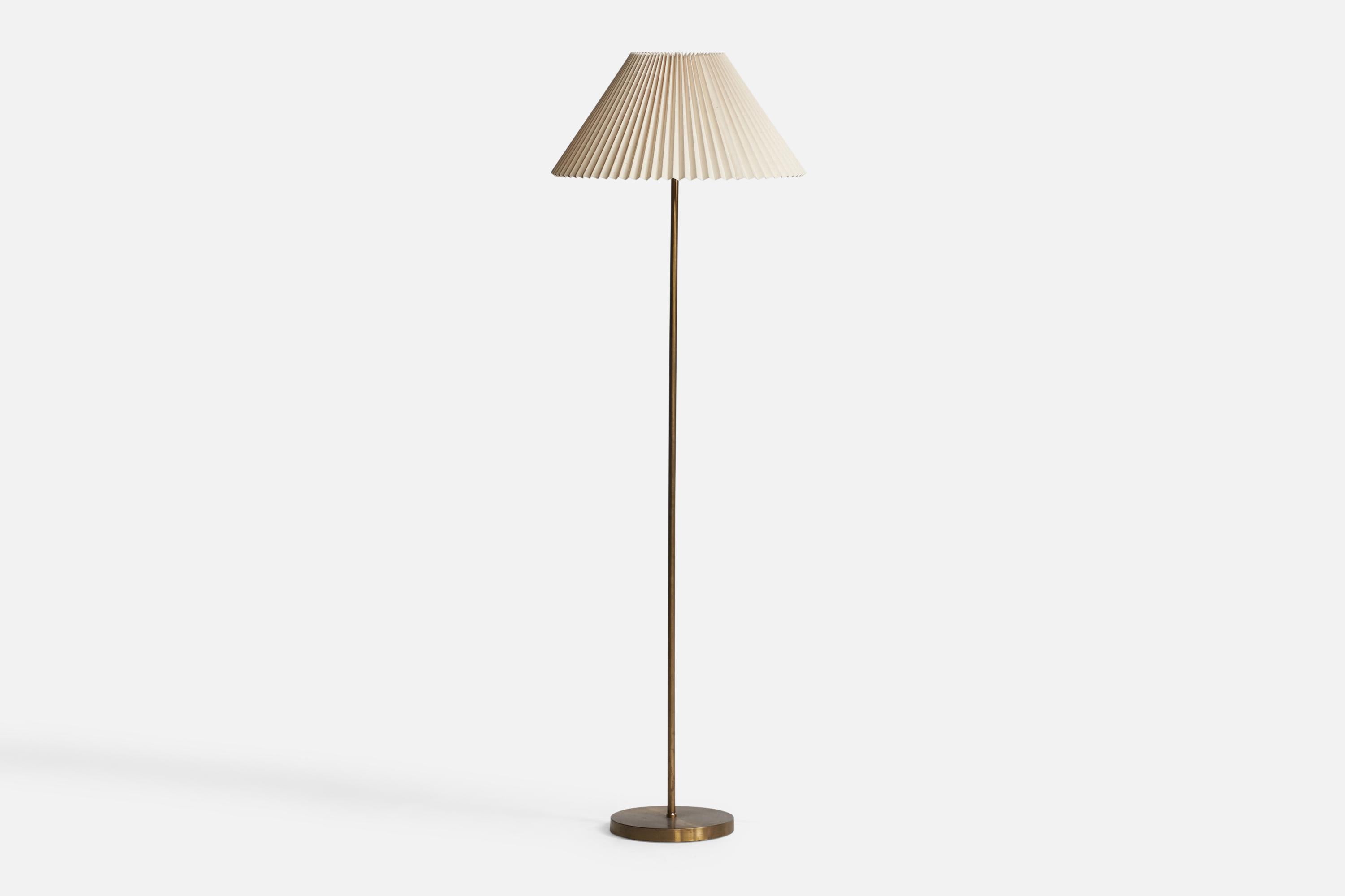 A brass and paper floor lamp designed and produced in Sweden, c. 1950s.

Overall Dimensions (inches): 60” H x 19” W x 19” D. Diameter of base is 9.5”, diameter of shade is 19”. Stated dimensions include shade.
Bulb Specifications: E-26 Bulb
Number