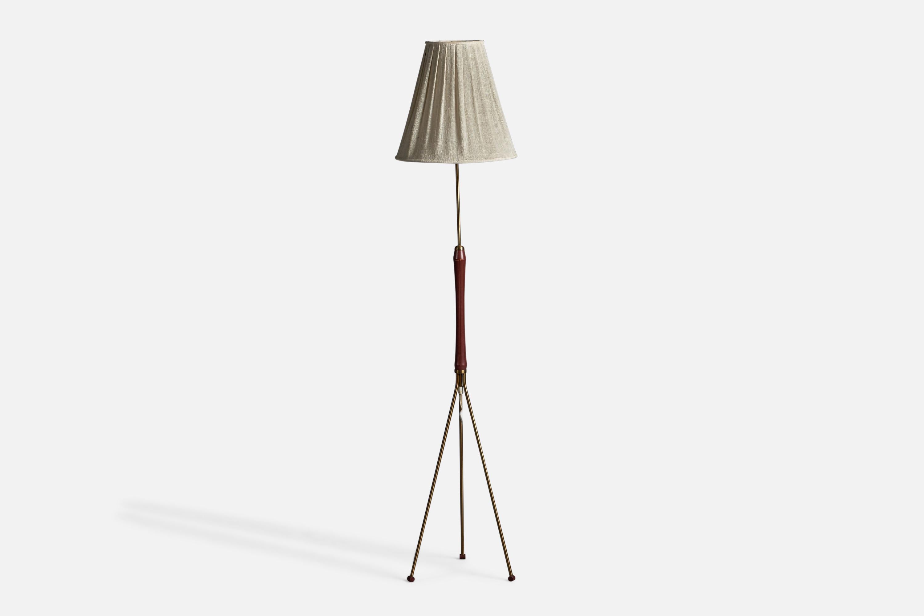 A brass, red-lacquered plastic and fabric floor lamp, designed and produced in Sweden, c. 1960s.

Overall Dimensions (inches): 60