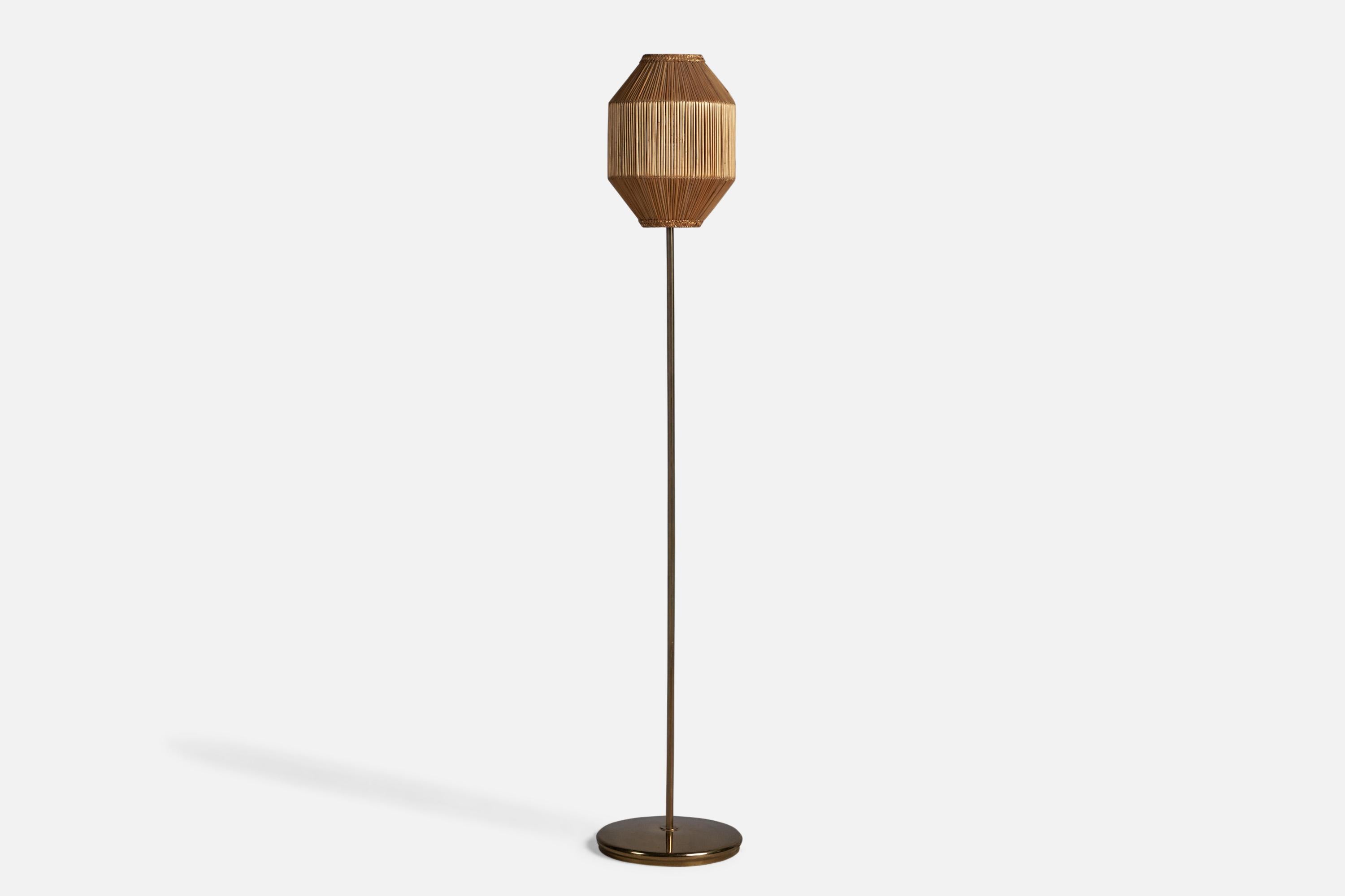 A brass and rattan floor lamp, designed and produced in Sweden, 1960s.

Overall Dimensions (inches): 53