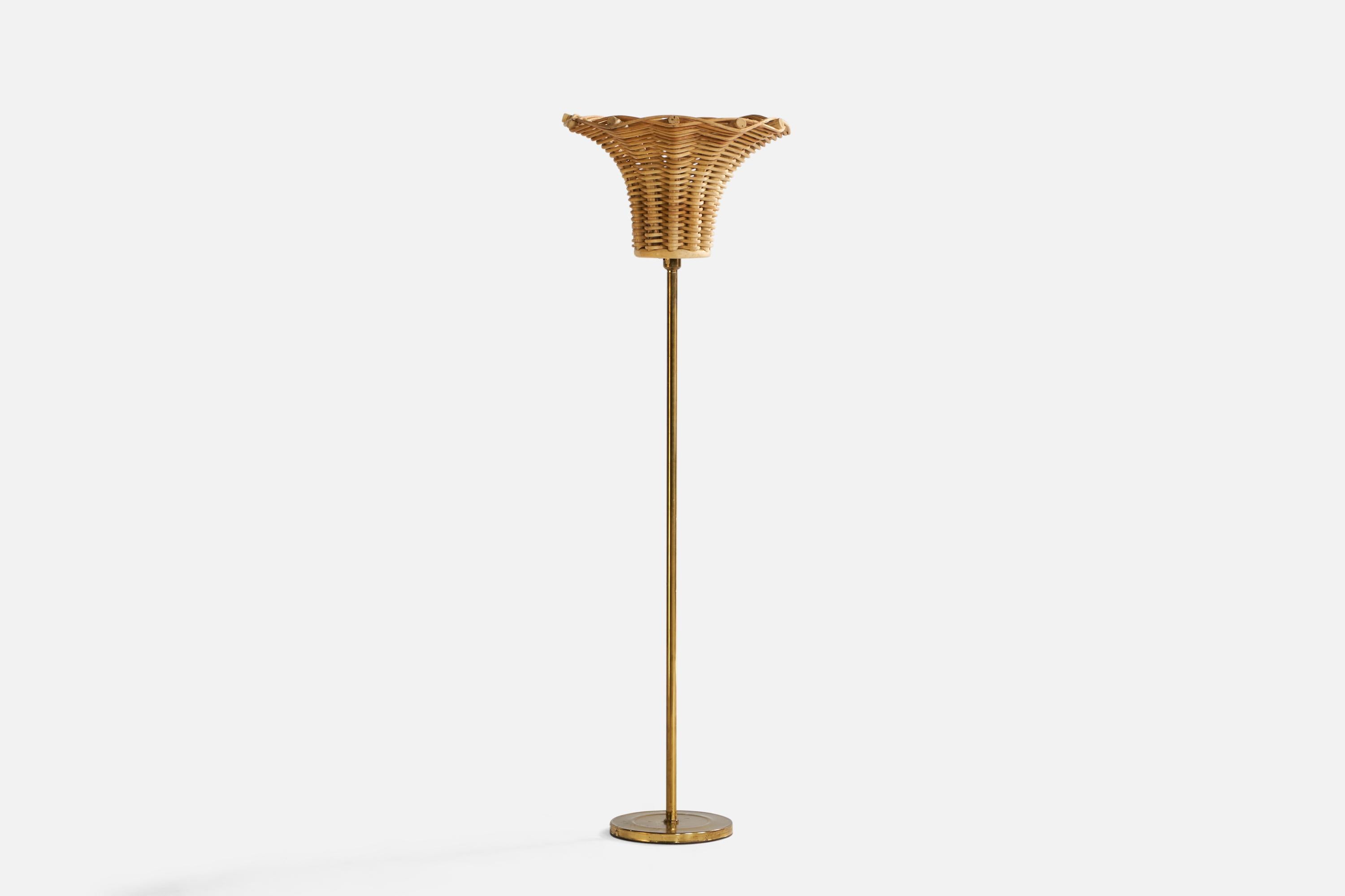 A brass, bamboo and rattan floor lamp designed and produced in Sweden, c. 1960s.

Overall Dimensions (inches): 57” H x 18” Diameter. Stated dimensions include shade.
Bulb Specifications: E-26 Bulb
Number of Sockets: 1
All lighting will be converted