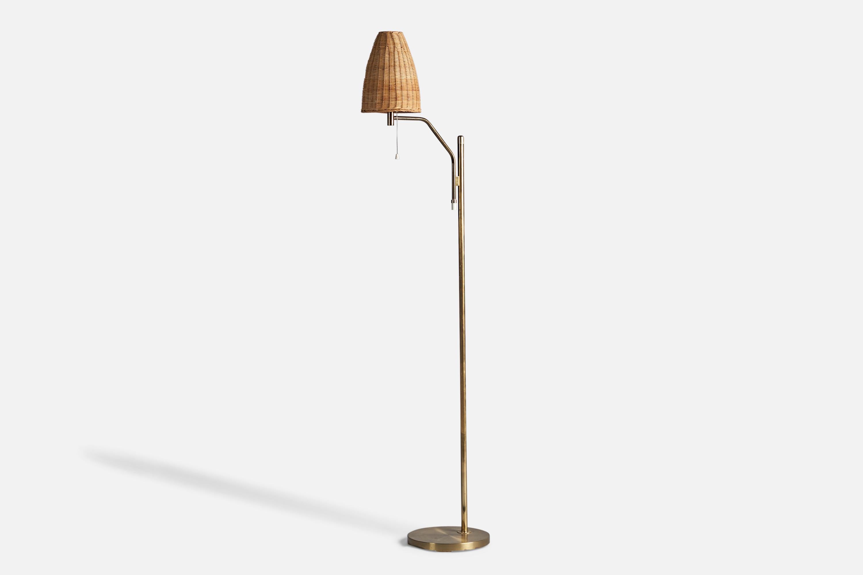 A brass and rattan floor lamp, designed and produced in Sweden, 1970s.

Overall Dimensions (inches): 62.75