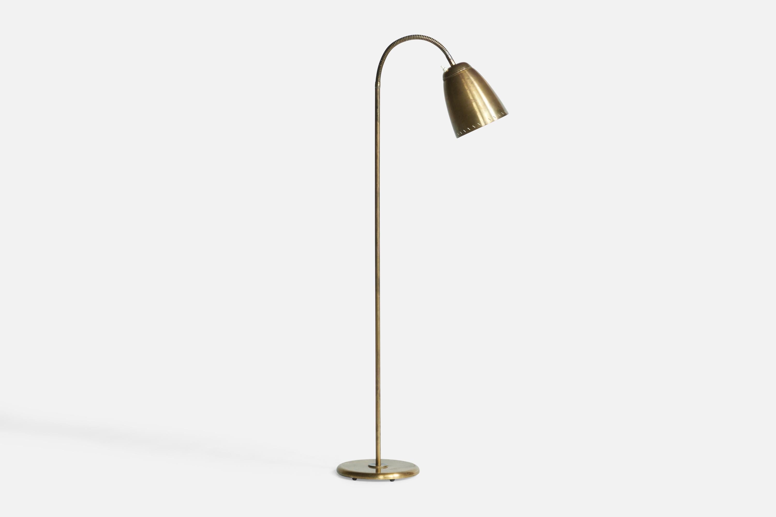 An adjustable brass floor lamp designed and produced in Sweden, 1940s.
Dimensions adjustable based on position of light.

Overall Dimensions (inches): 51.75” H x 10” W x 21.3” D. Base diameter is 10