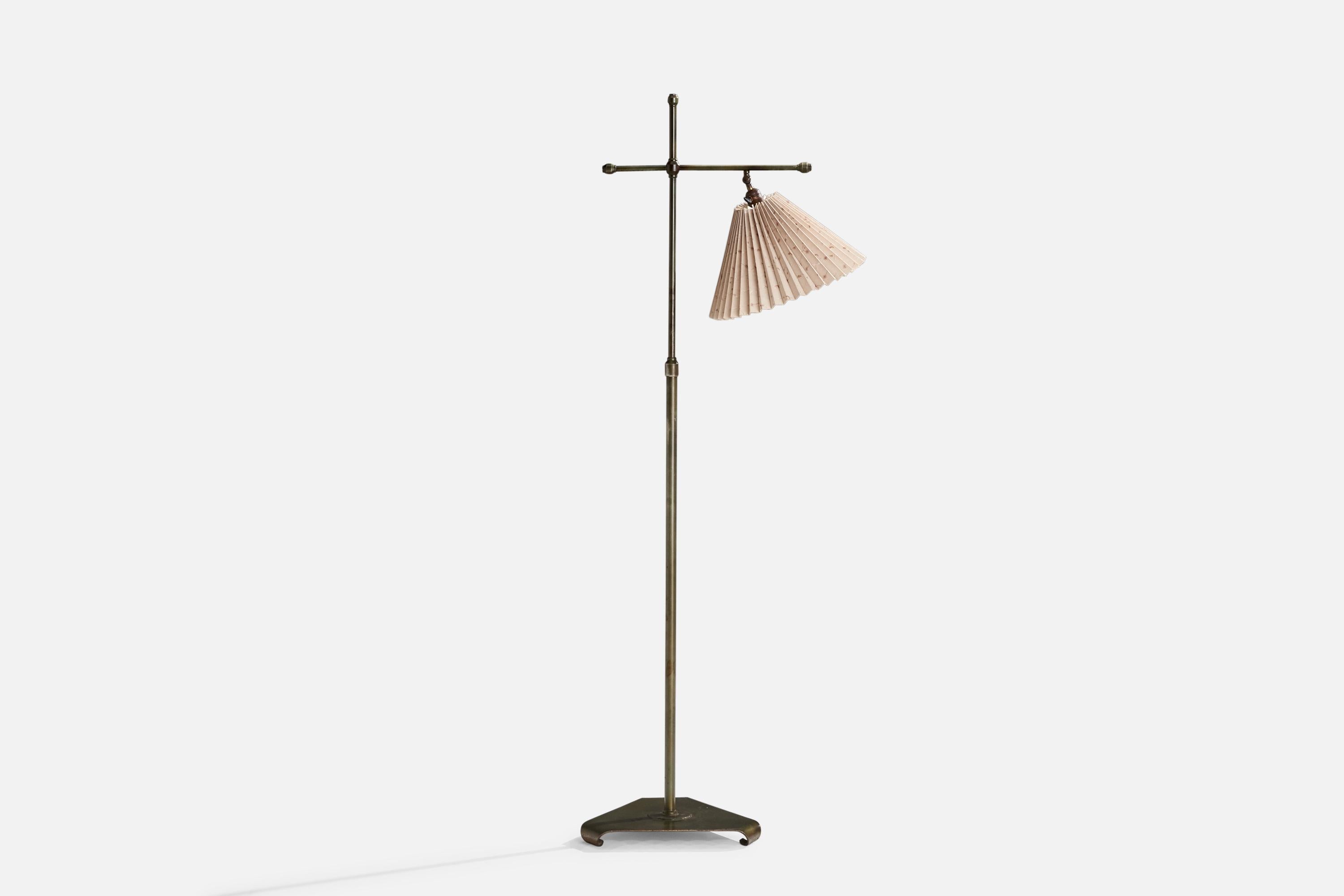 A bronze and pink beige fabric floor lamp designed and produced in Sweden, 1940s.

Dimensions variable. 

Overall Dimensions (inches): 64.75” H x 14” W x 23.75” D
Stated dimensions include shade.
Bulb Specifications: E-26 Bulb
Number of Sockets: