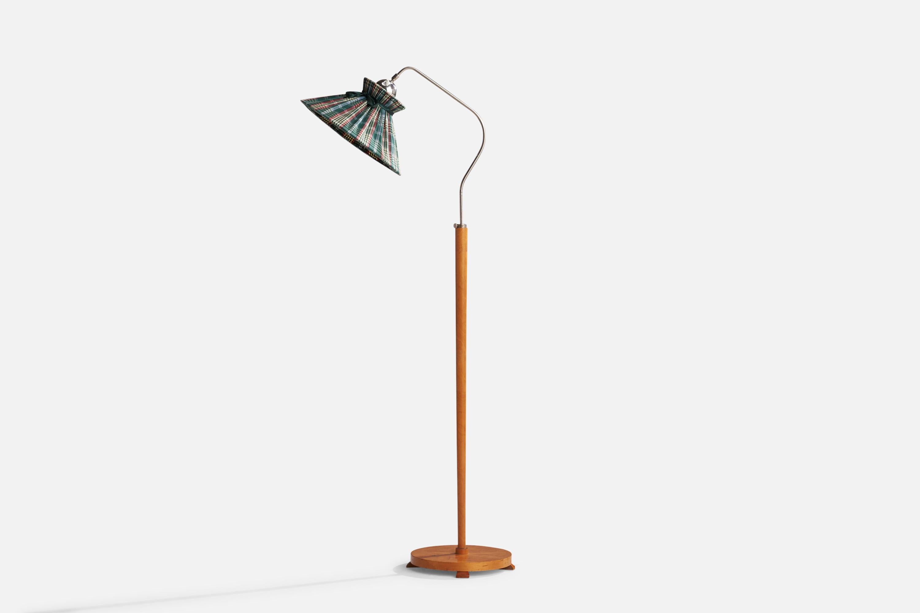 An adjustable birch, chrome-plated metal and fabric floor lamp designed and produced in Sweden, 1940s.

Dimensions variable.

Overall Dimensions (inches): 64” H x 15.5” W x 28”  D
Stated dimensions include shade.
Bulb Specifications: E-26
