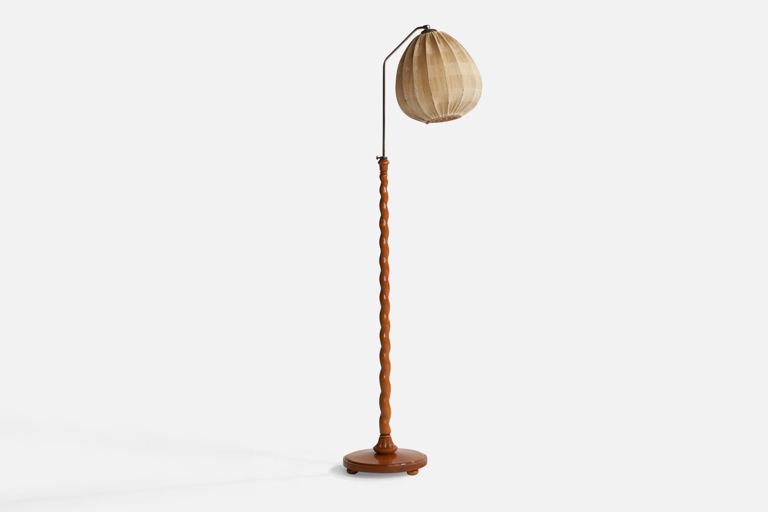 A wood, fabric and chrome-plated metal floor lamp designed and produced in Sweden, c. 1930s.

Overall Dimensions (inches): 59” H x 12.1” Diameter. Stated dimensions include shade.
Height and angle of shade are adjustable.
Bulb Specifications: E-26