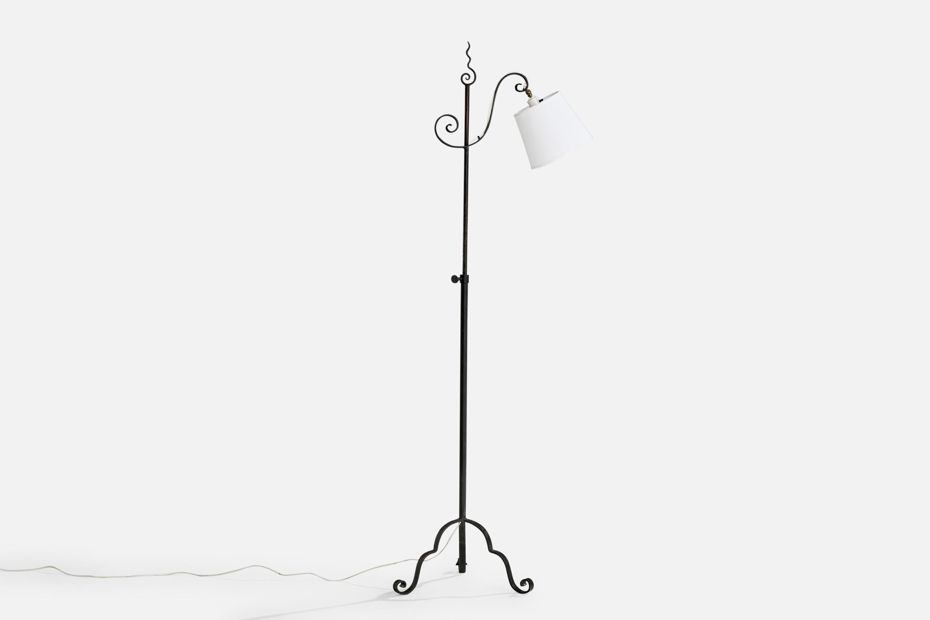 A black-painted iron and white fabric floor lamp designed and produced in Sweden, c. 1940s.

Dimensions of Lamp with Shade (inches): 63“ H x 16” W x 24.5” D

Bulb Specifications: E-26 Bulb

Number of Sockets (per fixture): 1

Sold with