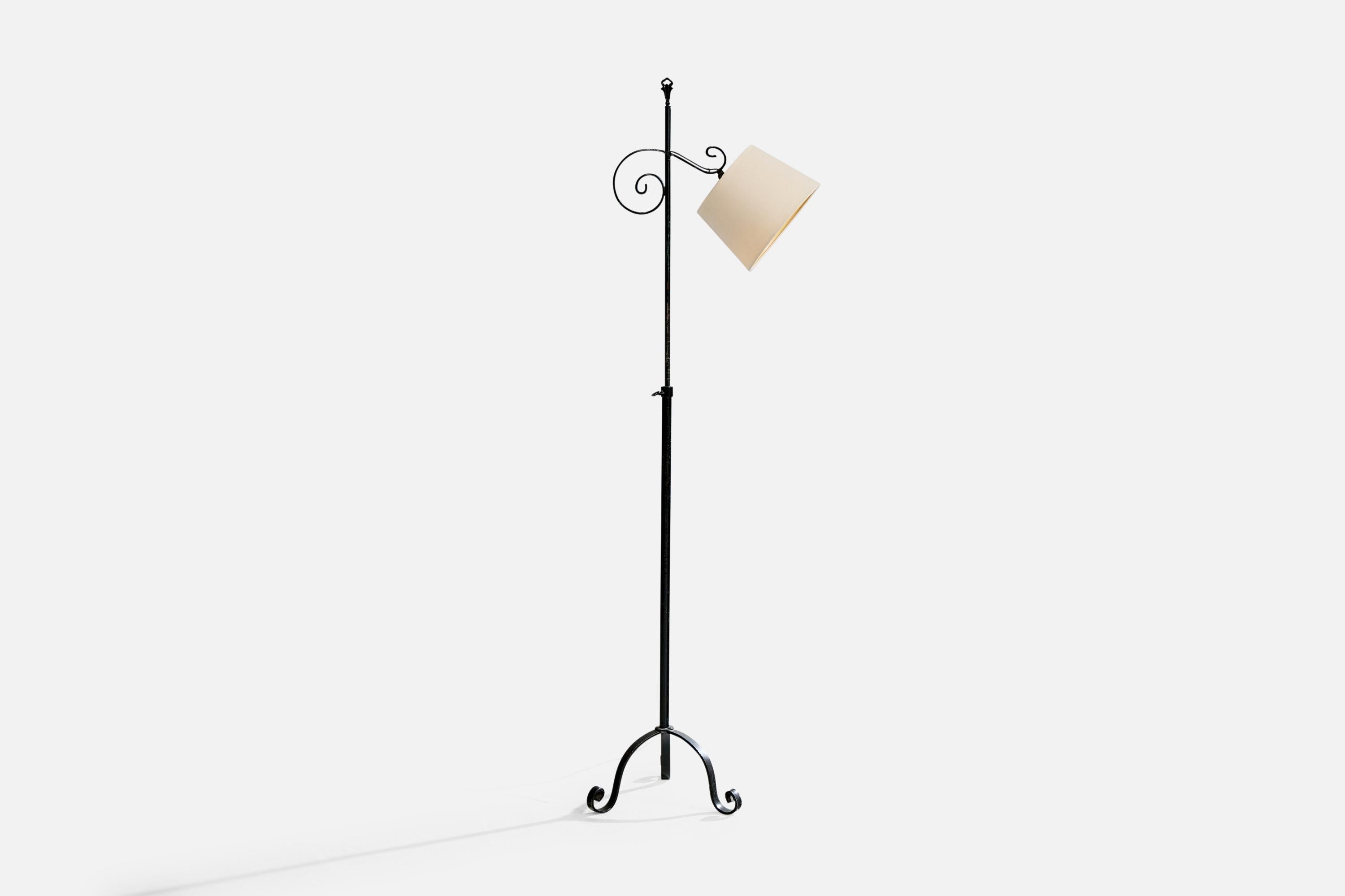 A black-painted iron and cream-white fabric floor lamp designed and produced in Sweden, c. 1940s.

Wear consistent with age and use. 

Losses to lacquer.

Overall height and shade adjustable; measured as shown

Overall Dimensions (inches): 61.5