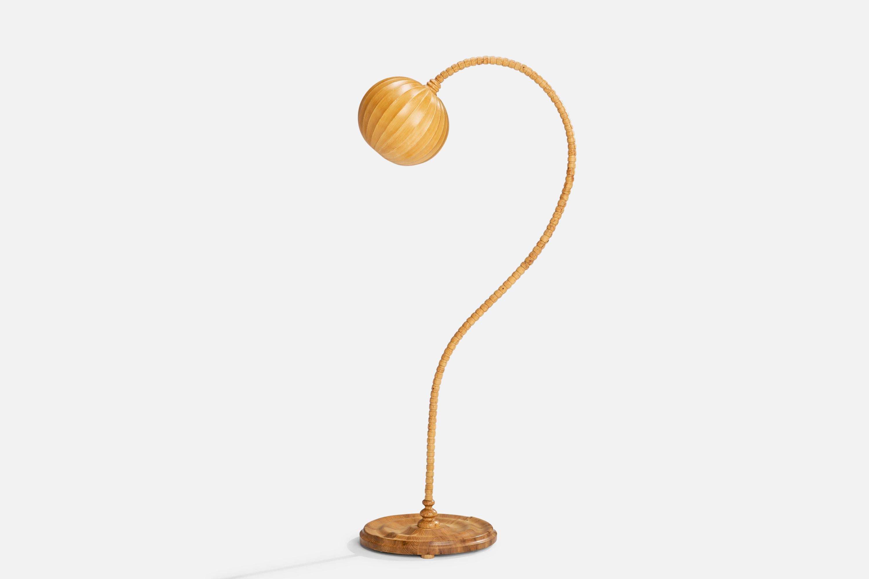 A masur birch, pine and waxed cotton floor lamp designed and produced in Sweden, c. 1960s.

Overall Dimensions (inches): 61.5”  H x 11.5”  W x 26” D
Stated dimensions include shade.
Bulb Specifications: E-26 Bulb
Number of Sockets: 1
All lighting