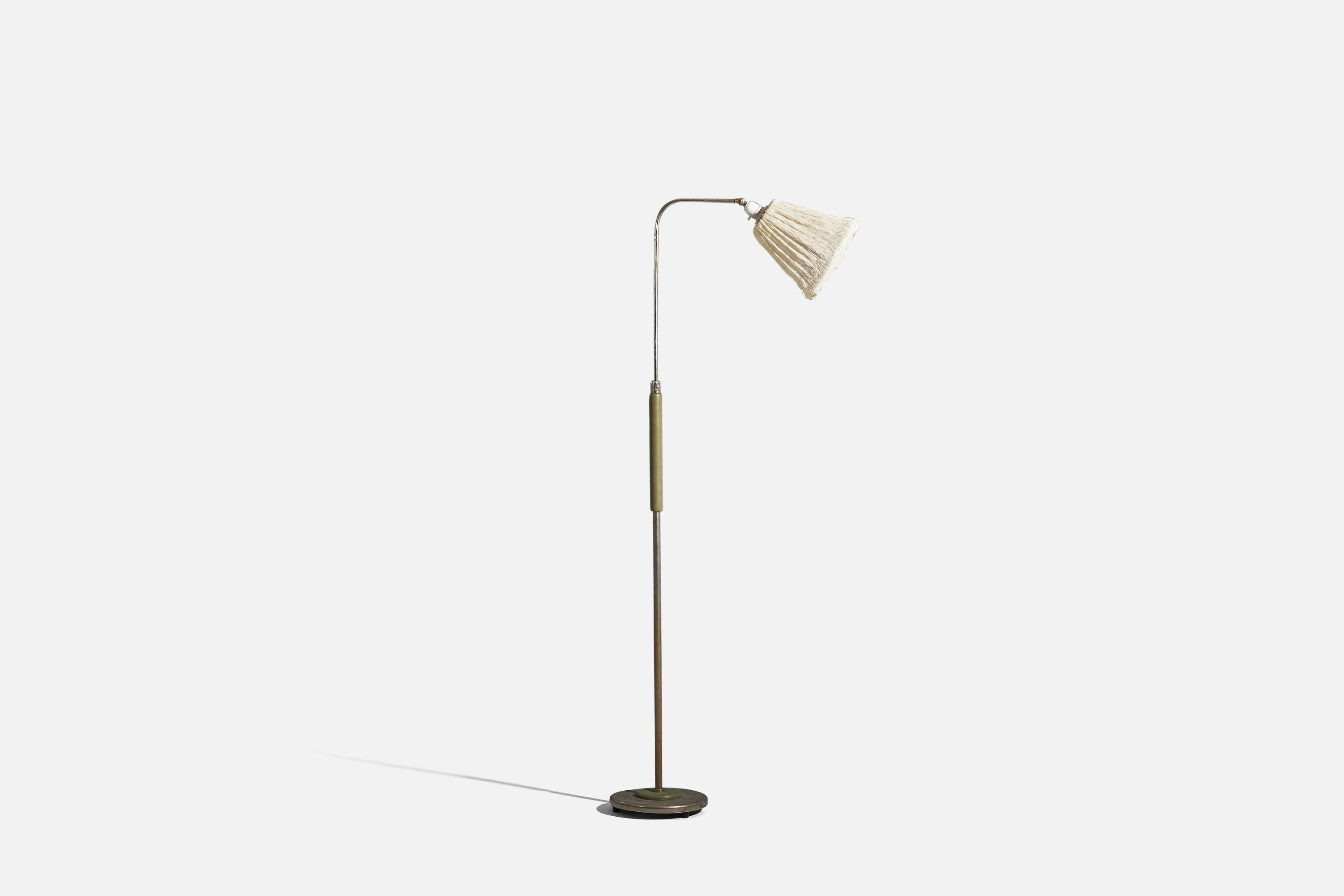 A metal, bakelite and grasscloth floor lamp designed and produced by a Swedish designer, Sweden, 1930s. 

