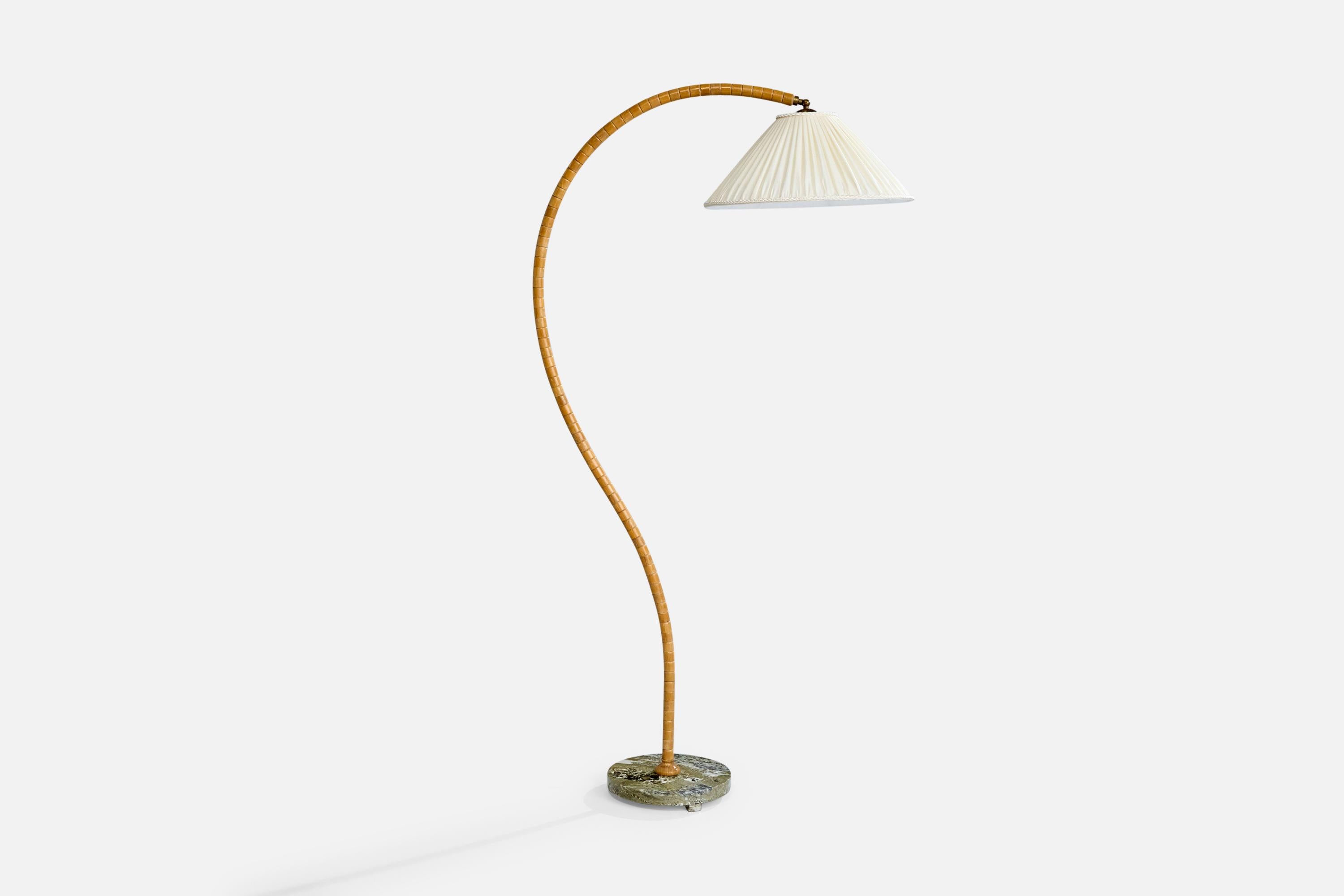 A curved oak, brass, Swedish green marble and fabric floor lamp designed and produced in Sweden, c. 1940s.

Dimensions of Lamp with Shade (inches): 64.5” H x 20“ W x 34“ D

Bulb Specifications: E-26 Bulb

Number of Sockets (per fixture): 1

Sold