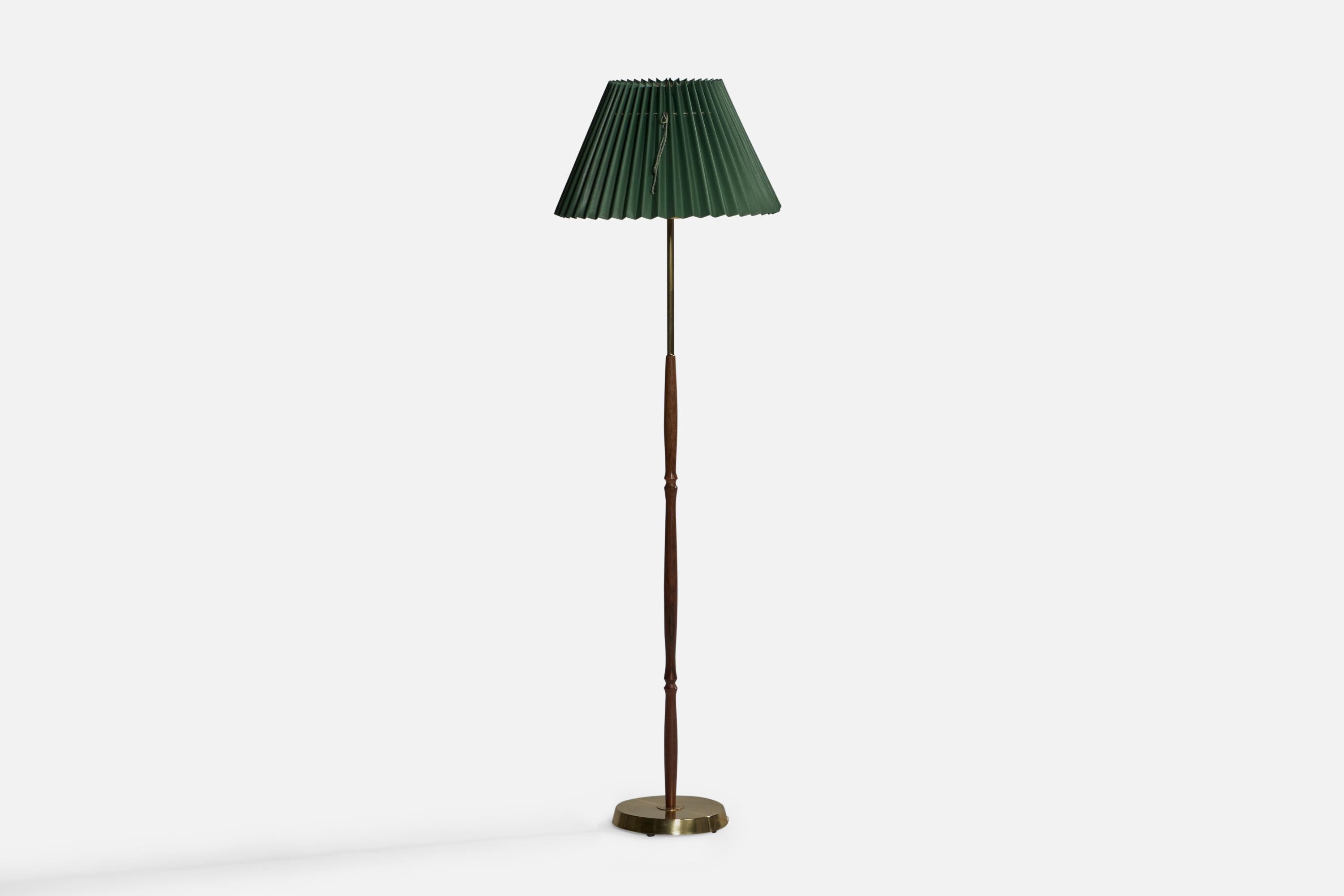 A brass, rosewood and green paper floor lamp designed and produced in Sweden, c. 1950s.

Overall Dimensions (inches): 58.45” H x 17.5” Diameter. Stated dimensions include shade.
Bulb Specifications: E-26 Bulb
Number of Sockets: 1
All lighting will