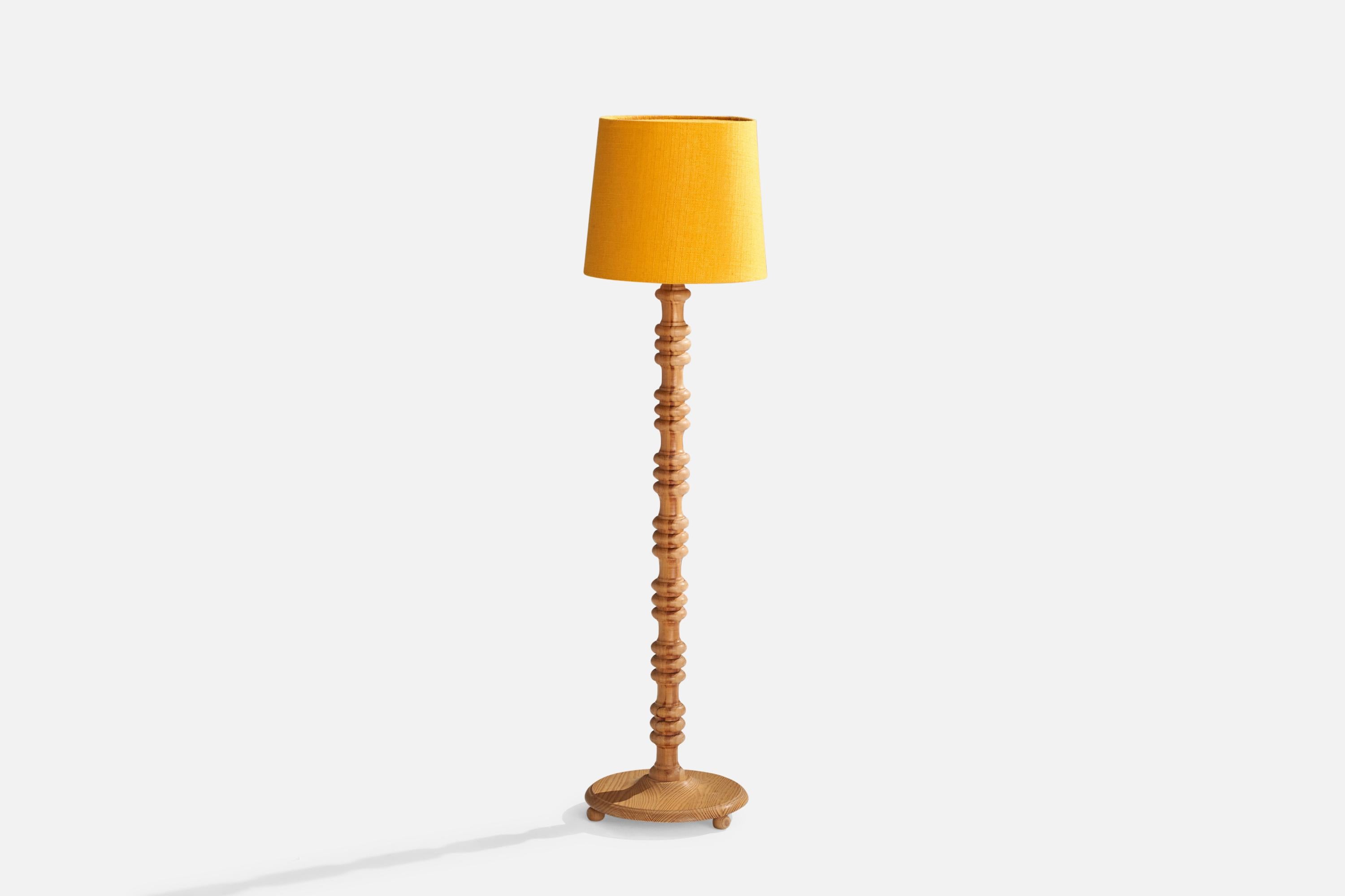 A pine and yellow fabric floor lamp designed and produced in Sweden, c. 1970s.
Overall Dimensions (inches): 49” H x 12.25” W x12.5” D
Stated dimensions include shade.
Bulb Specifications: E-26 Bulb
Number of Sockets: 1
All lighting will be converted