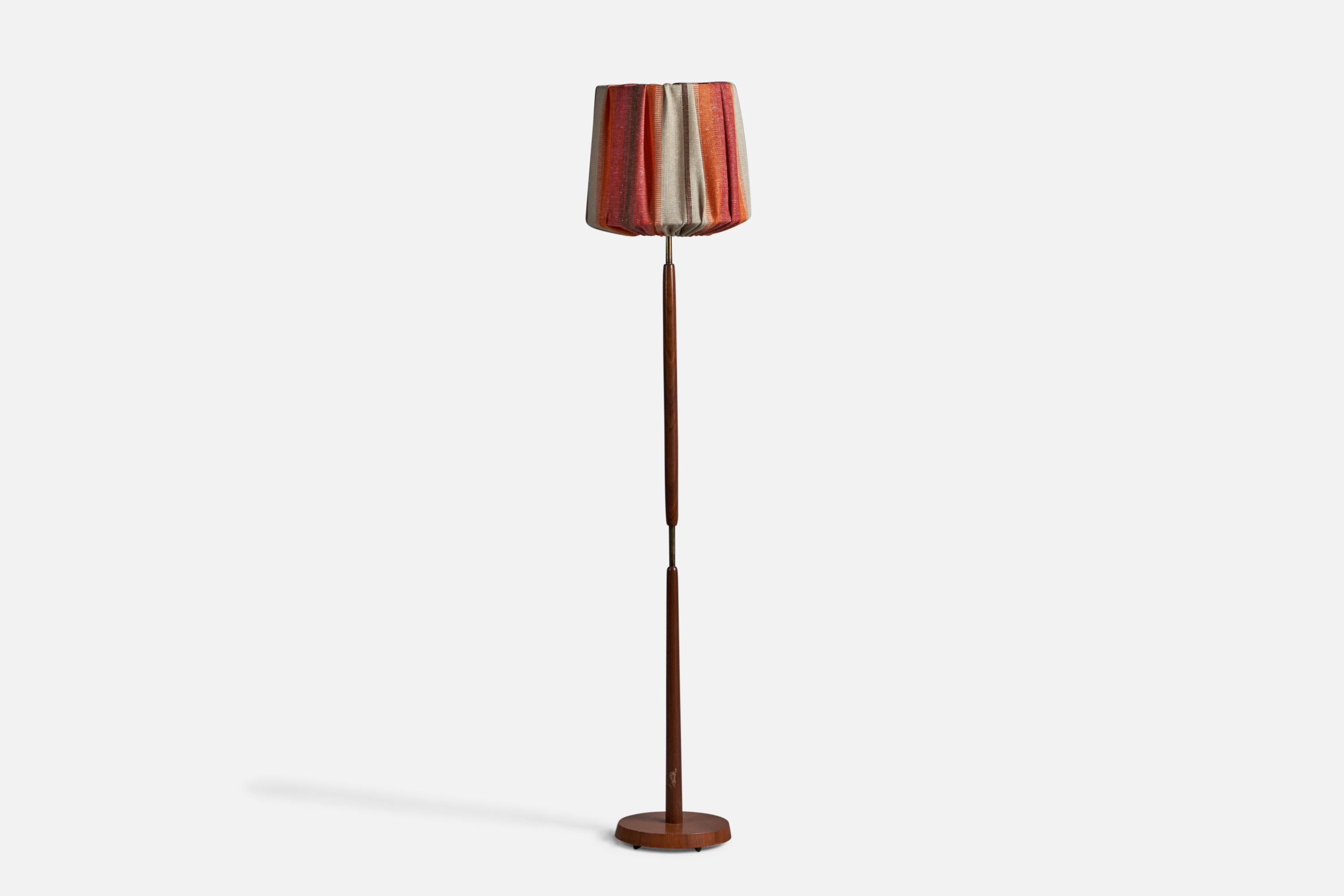 A teak, brass and red grey woven fabric lampshade, designed and produced in Sweden, c. 1950s.

Overall Dimensions (inches): 56.5