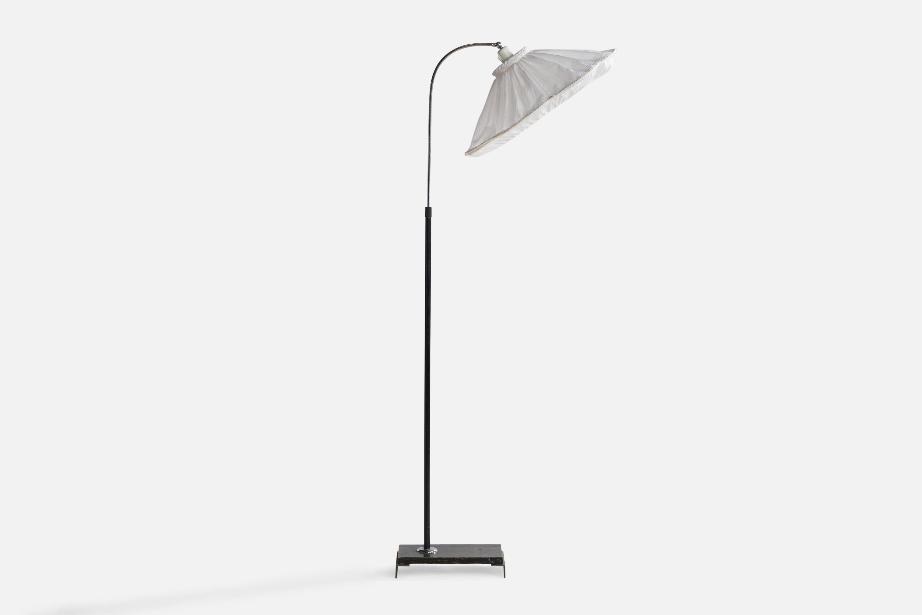 A black-lacquered wood, chrome and white fabric floor lamp designed and produced in Sweden, c. 1930s.

Overall Dimensions (inches): 60.5” H x 21” W x 24.25” Depth. Stated dimensions include shade.
Dimensions vary based on position of light. Height