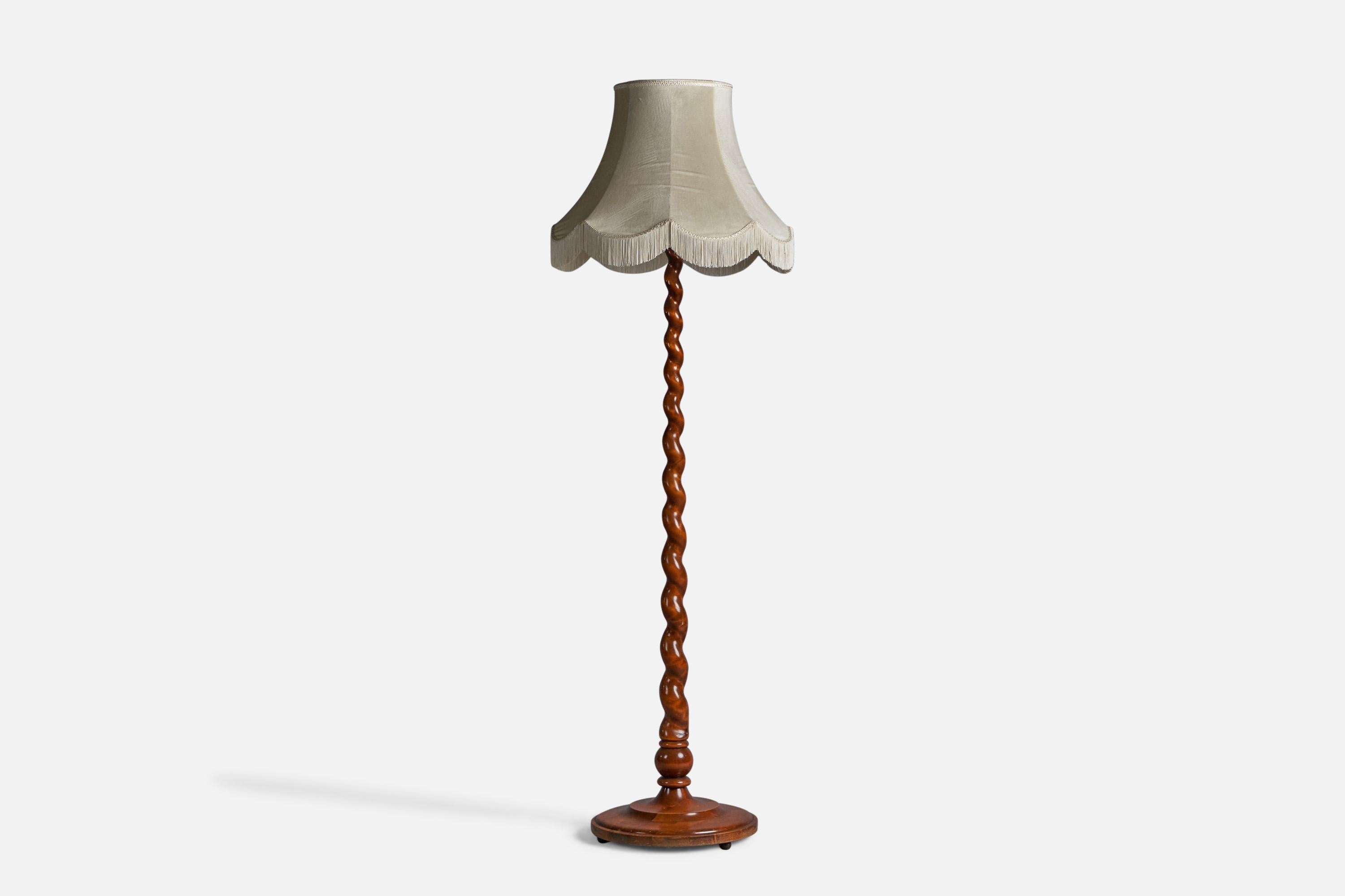 A carved wood and velvet floor lamp, designed and produced in Sweden, 1930s.

Overall Dimensions (inches): 68.5