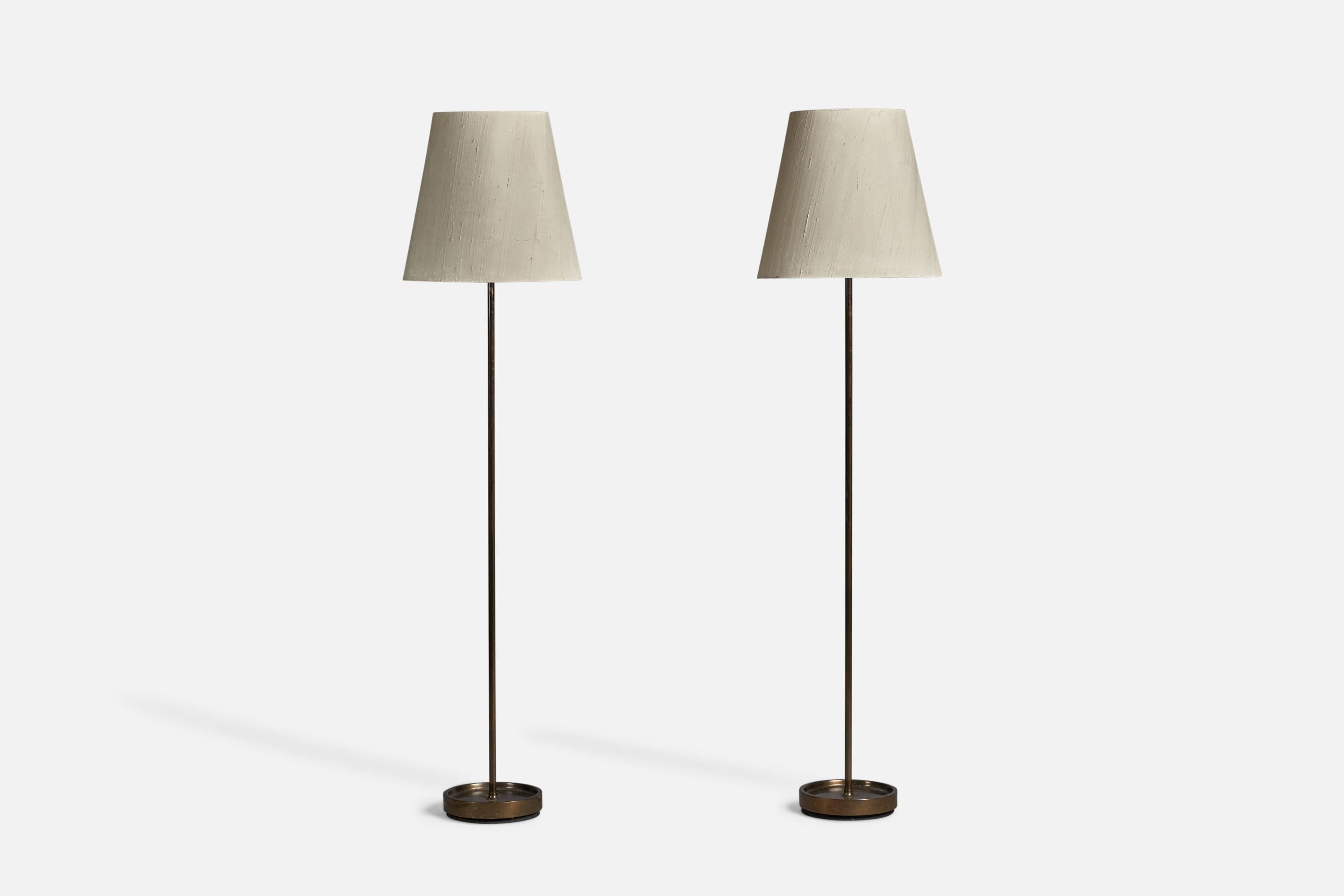 
A pair of brass and paper floor lamps, designed and produced in Sweden, 1950s.
Overall Dimensions (inches): 58.5