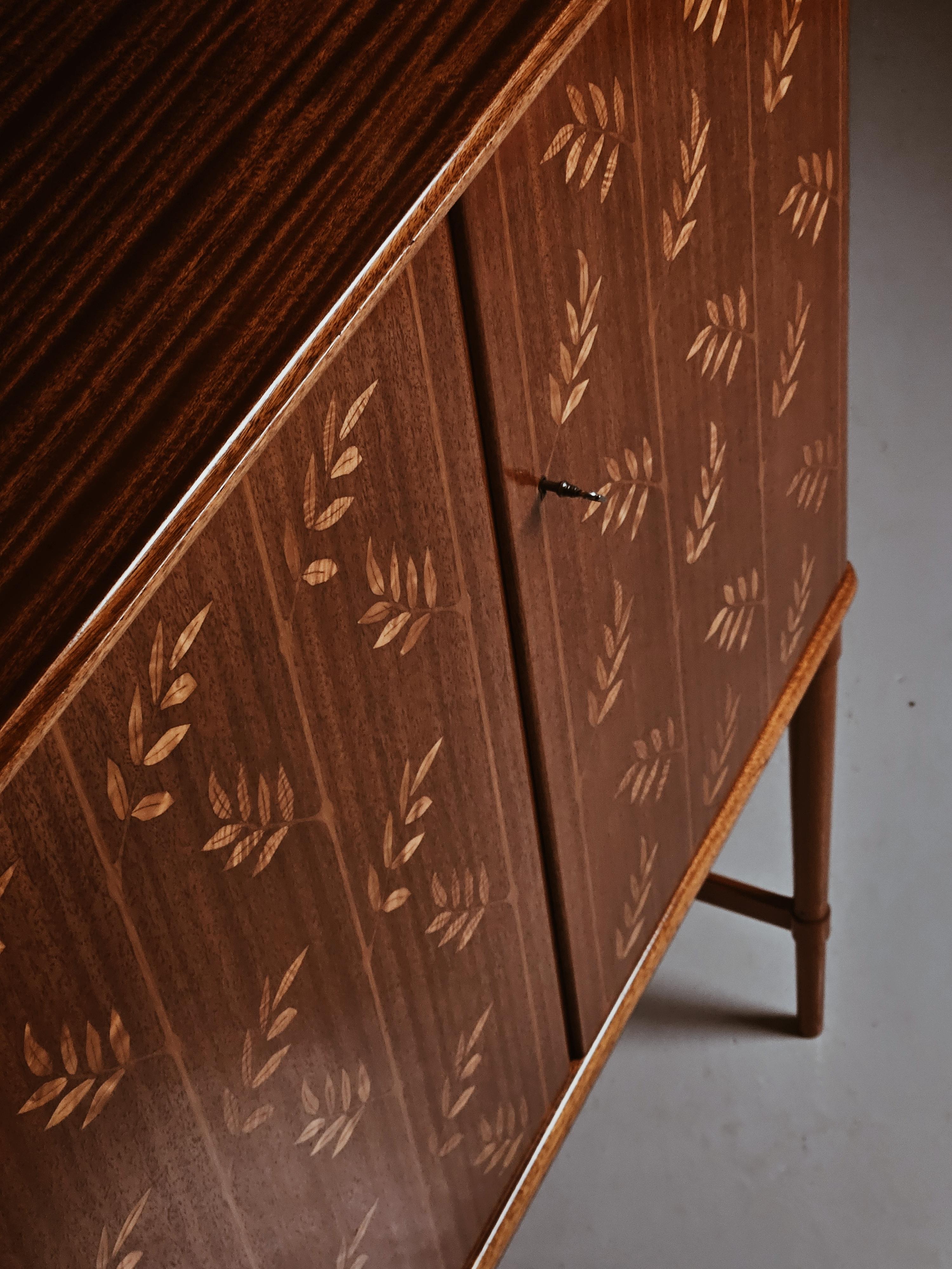 Scandinavian Modern Swedish designer floral bar cabinet by Möbelbolaget Tranås, 1940s