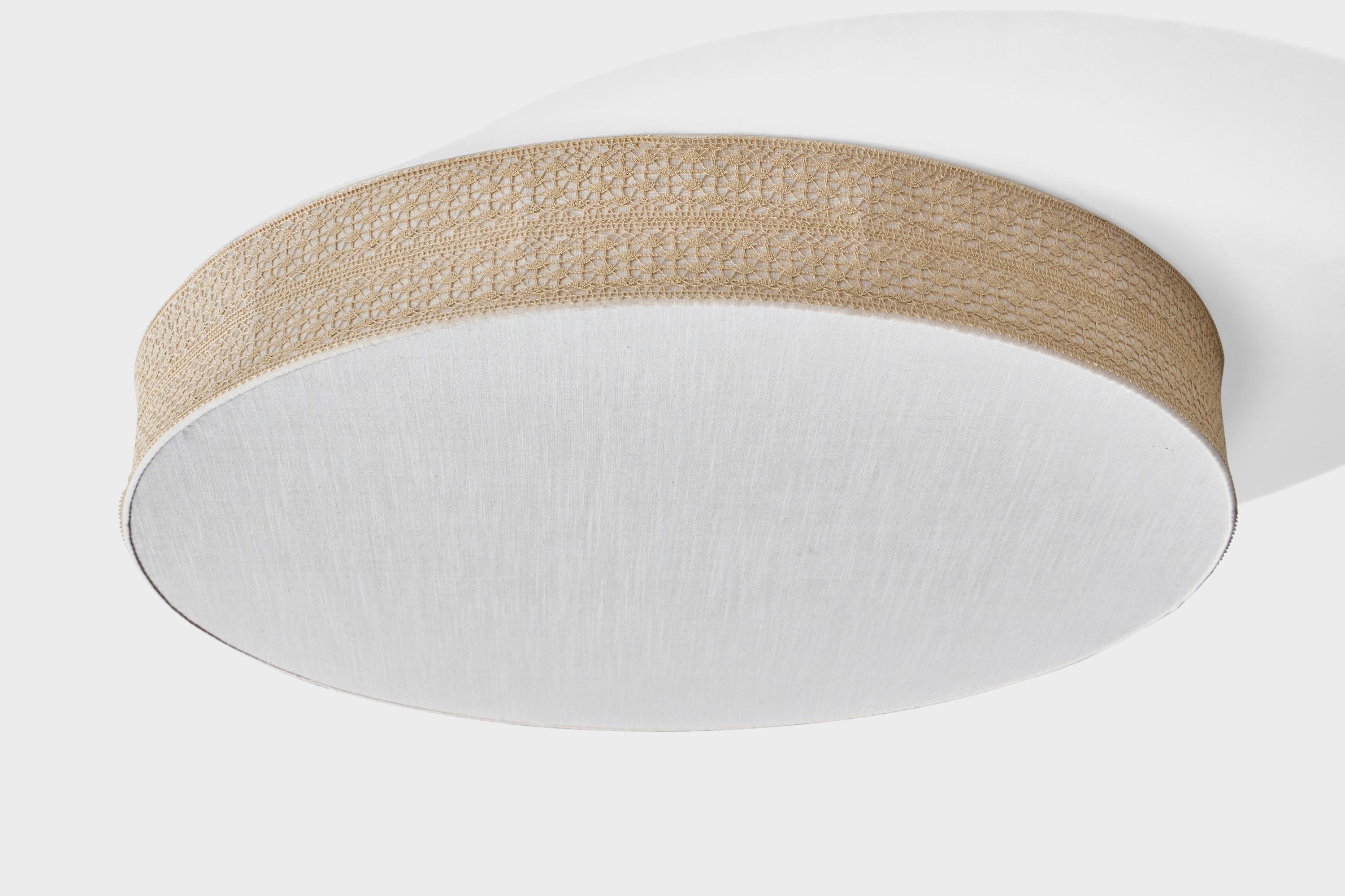 A white and beige embroidery fabric flush mount designed and produced in Sweden, c. 1970s.

Overall Dimensions (inches): 7.0