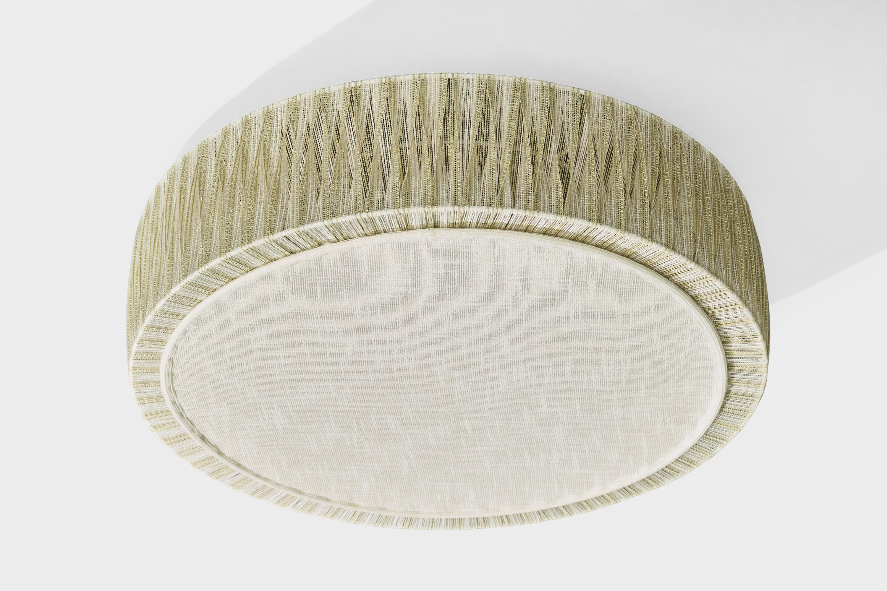 An off-white fabric flush mount designed and produced in Sweden, c. 1970s.

Good vintage condition.

Overall Dimensions (inches): 5.55