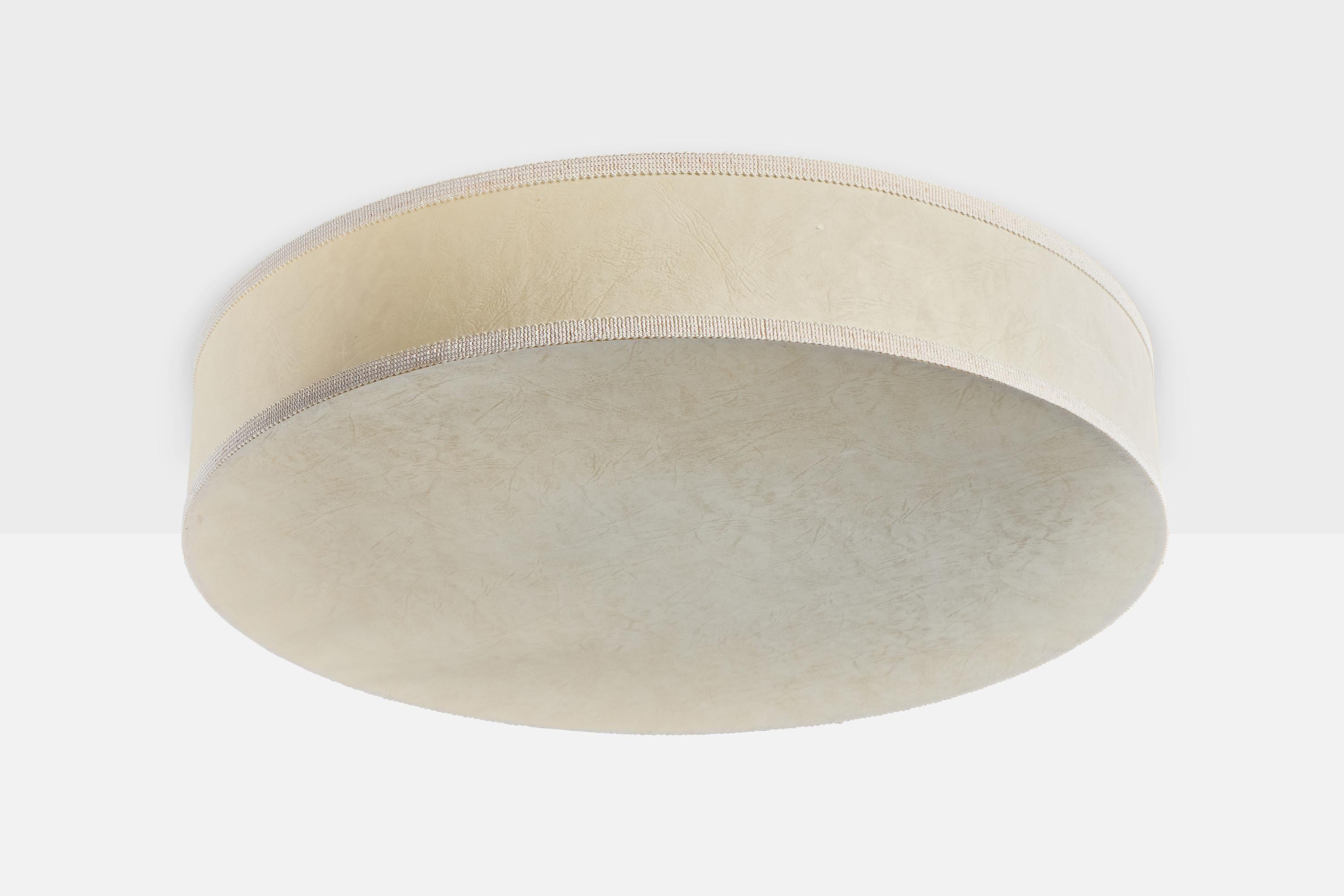 An off-white parchment paper and fabric flush mount designed and produced in Sweden, c. 1970s.

Overall Dimensions (inches): 5.9