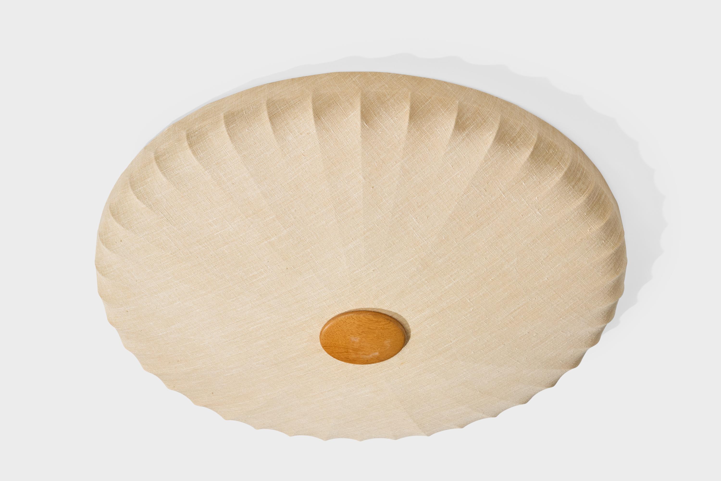 A sizable off-white fabric and wood flush mount designed and produced in Sweden, c. 1950s.

Overall Dimensions (inches): 6.0