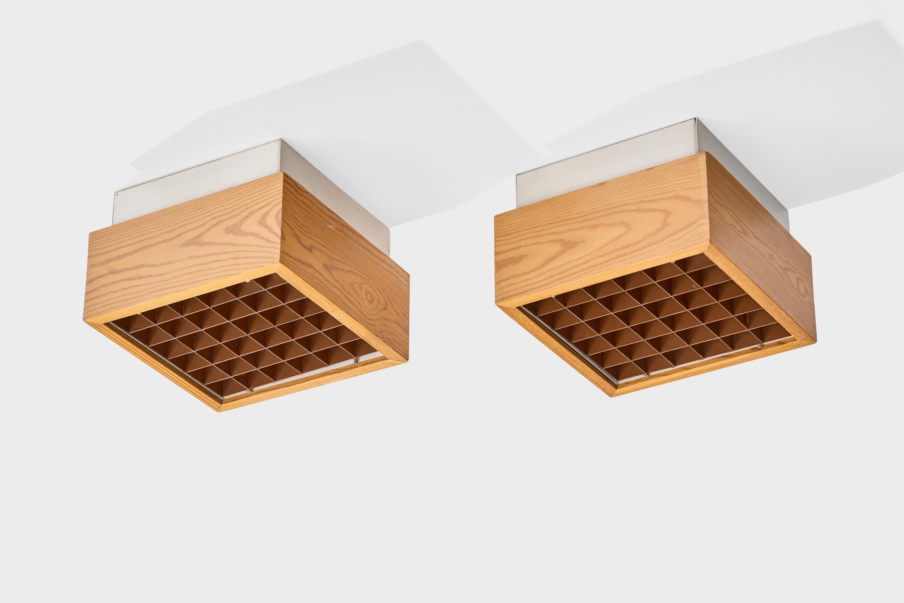 A pair of pine, white-lacquered metal and copper flush mounts designed and produced in Sweden, c. 1970s.

Overall Dimensions (inches): 5.5