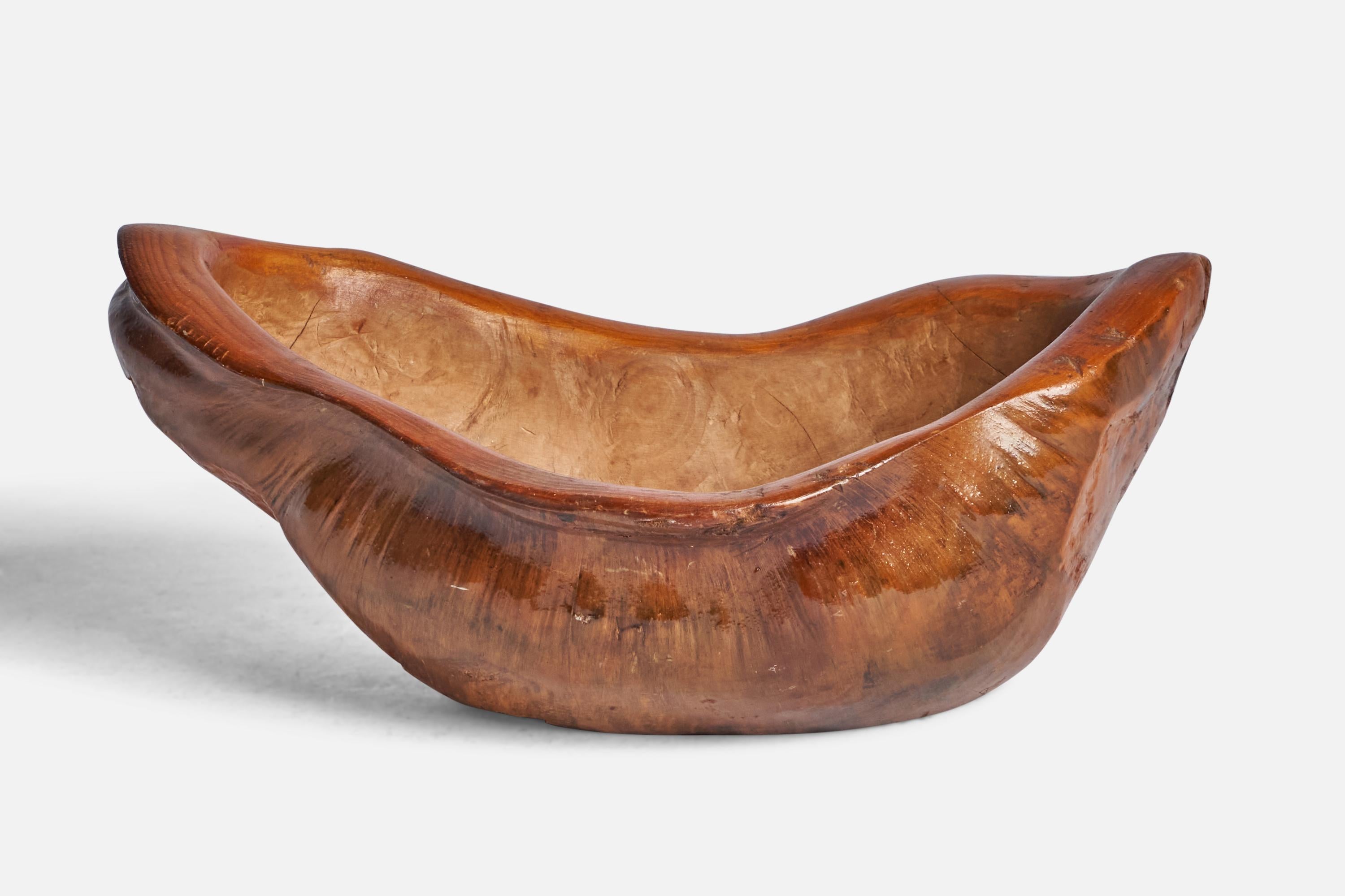 A freeform burl wood bowl designed and produced in Sweden, 1960s.