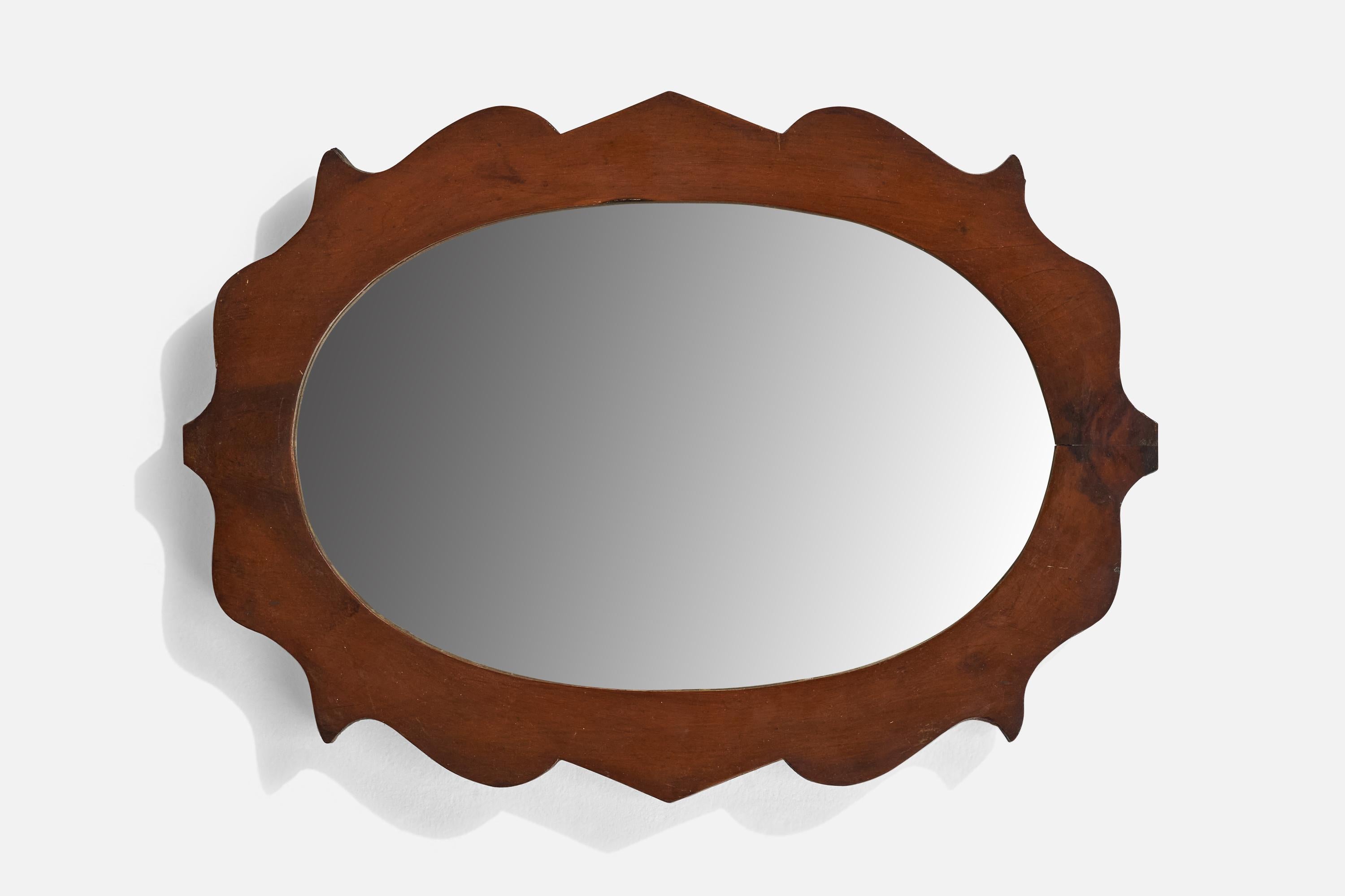 A freeform birch wall mirror designed and produced in Sweden, c. 1940s.