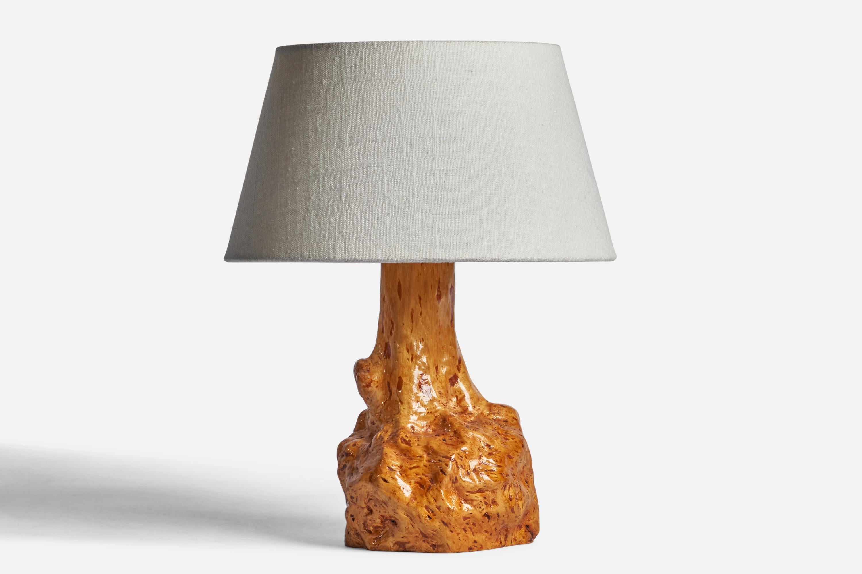 A freeform burl wood table lamp designed and produced in Sweden, c. 1960s.

Dimensions of Lamp (inches): 10” H x 5.25” Diameter
Dimensions of Shade (inches): 7” Top Diameter x 10” Bottom Diameter x 5.5” H 
Dimensions of Lamp with Shade (inches):